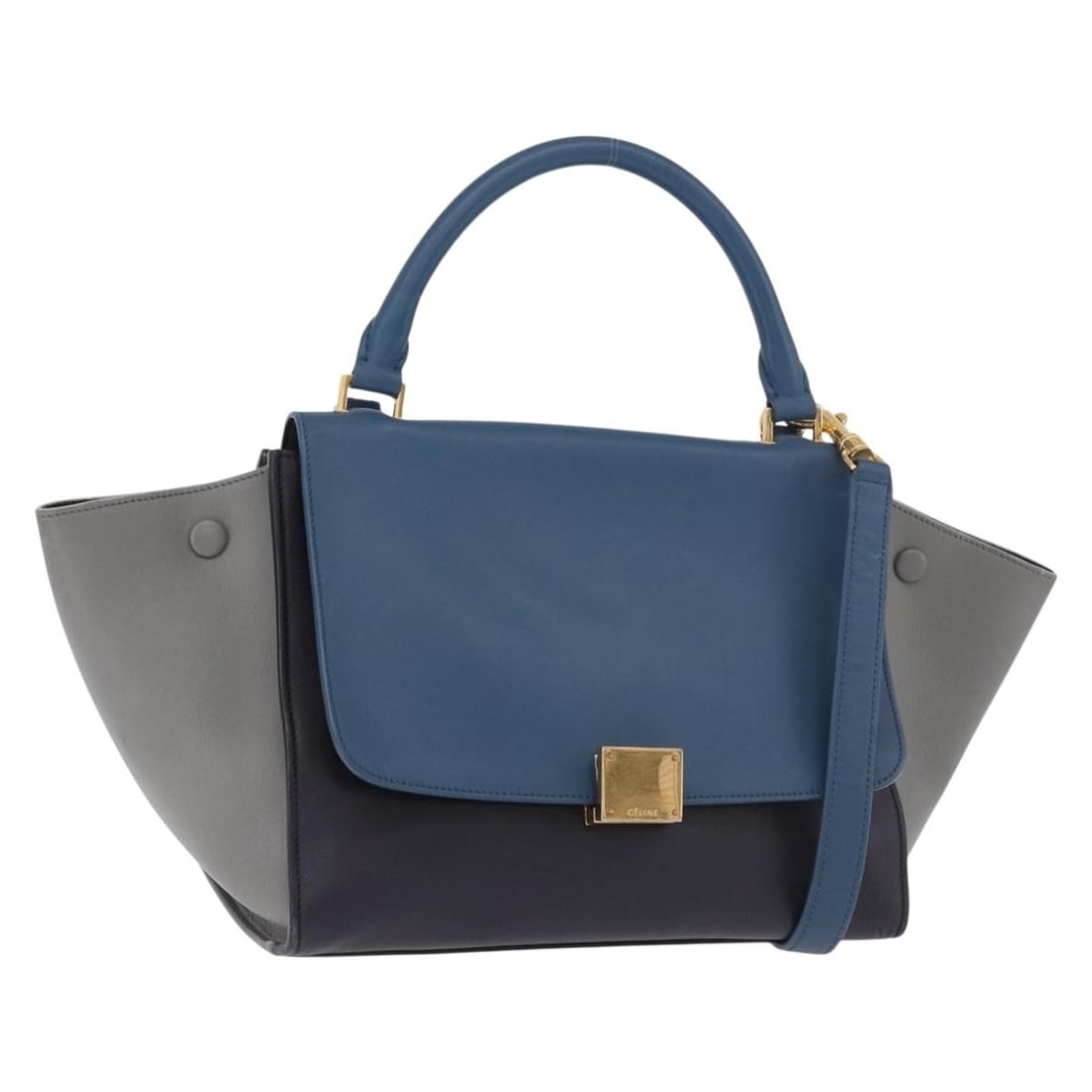 CELINE Trapeze 2way Leather Handbag Blue with Dust Bag Strap: CELINE Trapeze 2way Leather Handbag Blue with Dust Bag Strap Celine Trapeze 2-way handbag in blue leather with gold-tone accents. Made in Italy, this women's handbag includes a dust bag and shoulder s
