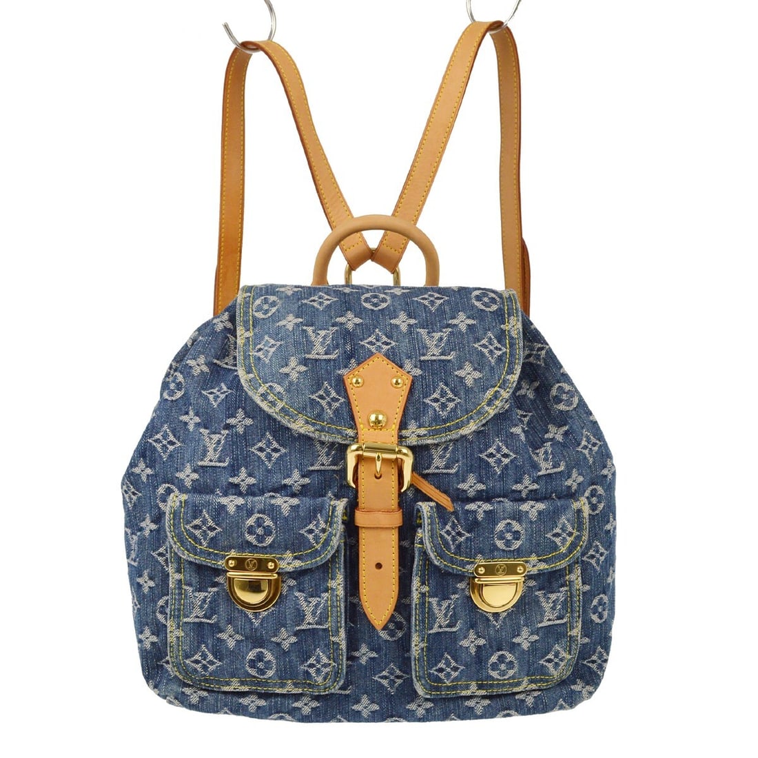 Louis Vuitton Sac a Dos GM Blue Monogram Denim Backpack M95056: Louis Vuitton Sac a Dos GM Blue Monogram Denim Backpack M95056 Louis Vuitton Sac a Dos GM backpack in blue monogram denim with leather details and gold-plated hardware. It features a buckle closure, a