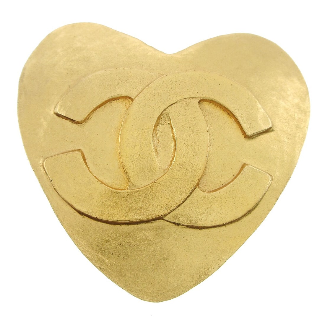 Chanel 95P Heart Brooch Gold Tone: Chanel 95P Heart Brooch Gold Tone Heart motif brooch in a gold-tone finish, made in France. This piece features the classic Chanel heart design and is noted as being in very good condition. Specificat