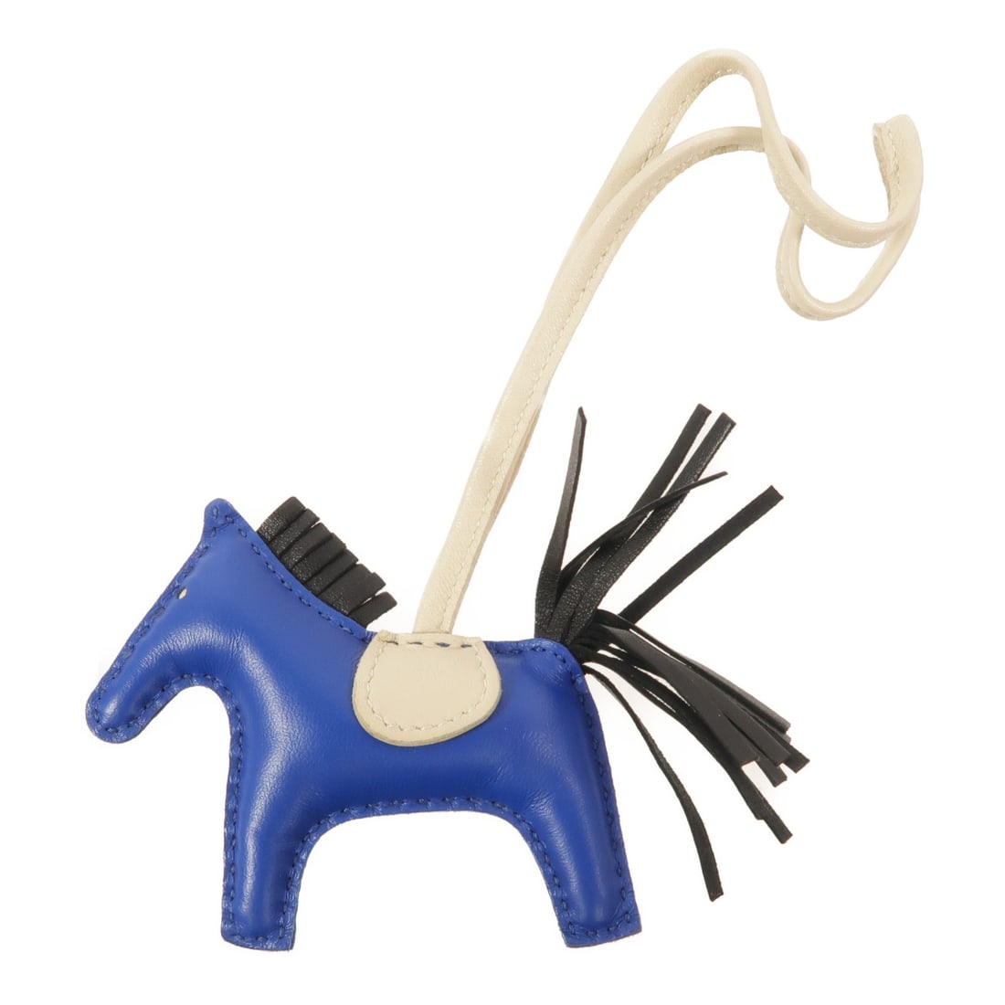 Hermes Rodeo PM Lambskin Charm Bleu France and Noir: Hermes Rodeo PM Lambskin Charm Bleu France and Noir Hermes Rodeo PM charm crafted in Agneau Milo lambskin with a Bleu France, black, and blue color combination. Made in France, this women's charm is o
