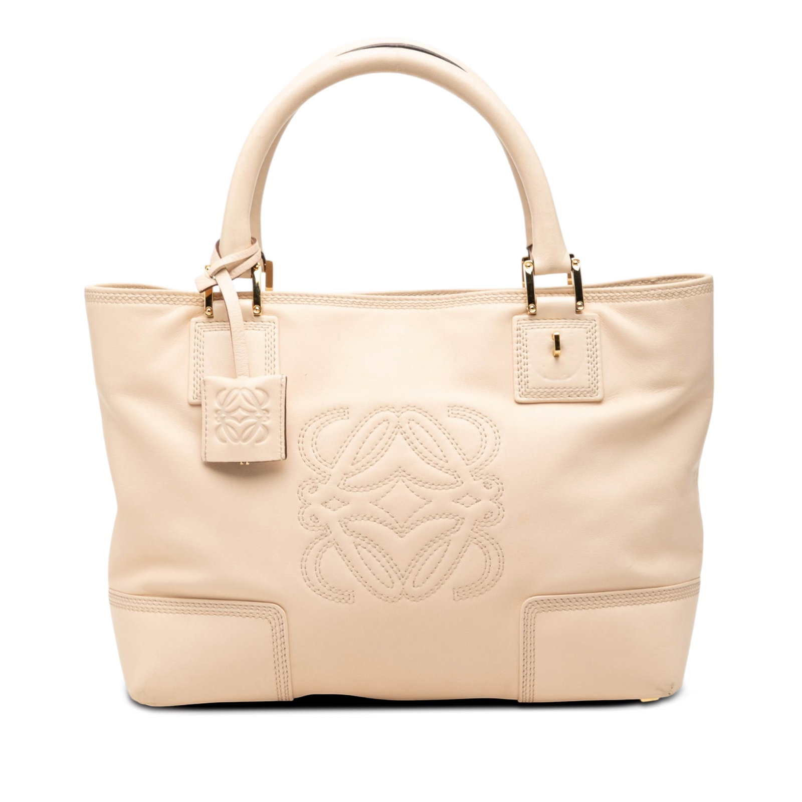 LOEWE Fusta 30 Brown Leather Tote Bag: LOEWE Fusta 30 Brown Leather Tote Bag LOEWE Leather Fusta 30 Tote in brown leather with rolled leather handles, an open top with magnetic snap button closure, and an interior with zip and slip pockets