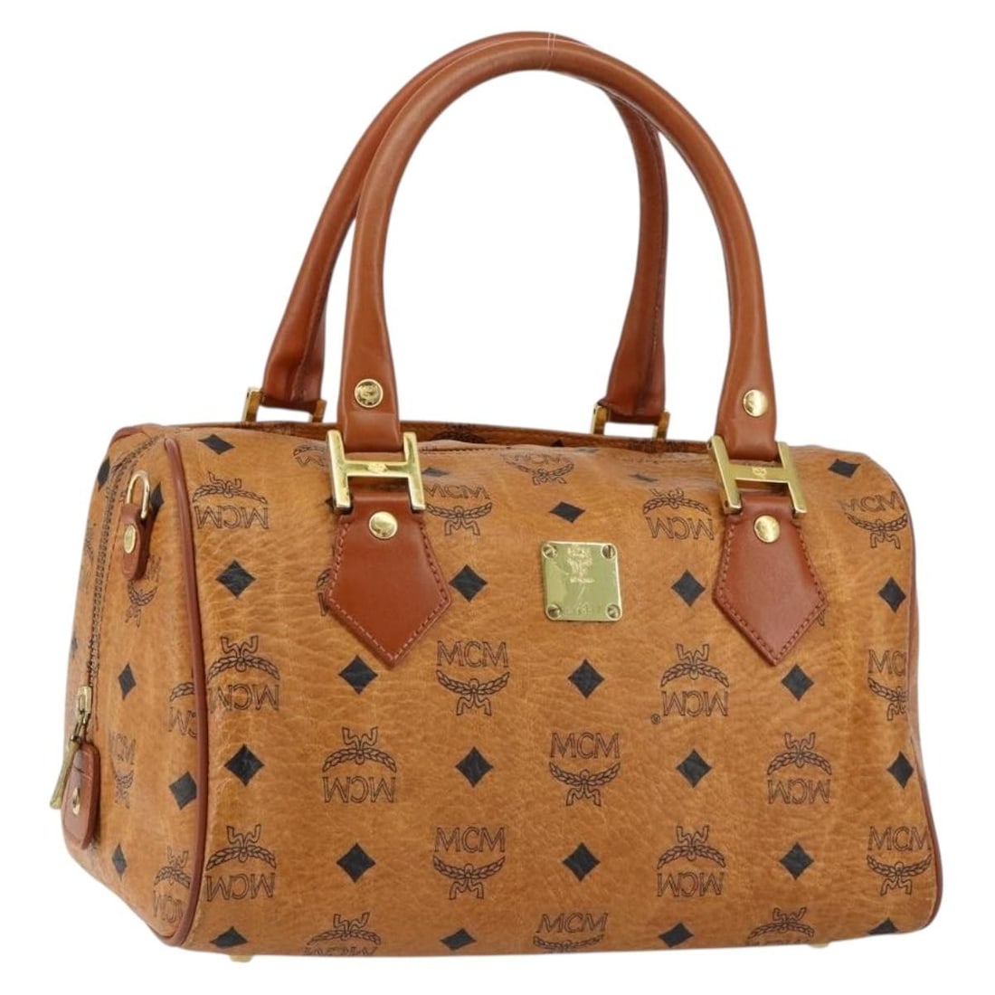MCM Logogram Vicetos Brown Gold PVC Leather Hand Bag Auth GH1221: MCM Logogram Vicetos Brown Gold PVC Leather Hand Bag Auth GH1221 Discover the elegance of the MCM Logogram Vicetos Hand Bag, expertly crafted in Germany from durable PVC leather. This stylish handbag 
