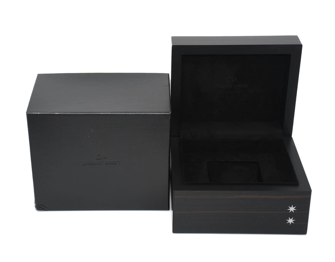 Presentation Case for Jaquet Droz Single Watch 8x6x6 Inches: Presentation Case for Jaquet Droz Single Watch 8x6x6 Inches This is a pre-owned Jaquet Droz presentation box designed to hold a single watch. The box is 100% authentic and provides a secure and elegan