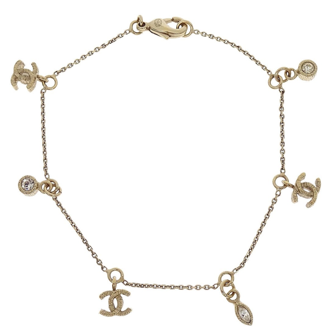 CHANEL CC Gold Plated Chain Bracelet with Rhinestones: CHANEL CC Gold Plated Chain Bracelet with Rhinestones Chanel rhinestone CC chain bracelet in gold tone with a chain/link style. Made in Italy, this bracelet features rhinestone detailing and a gold-pl