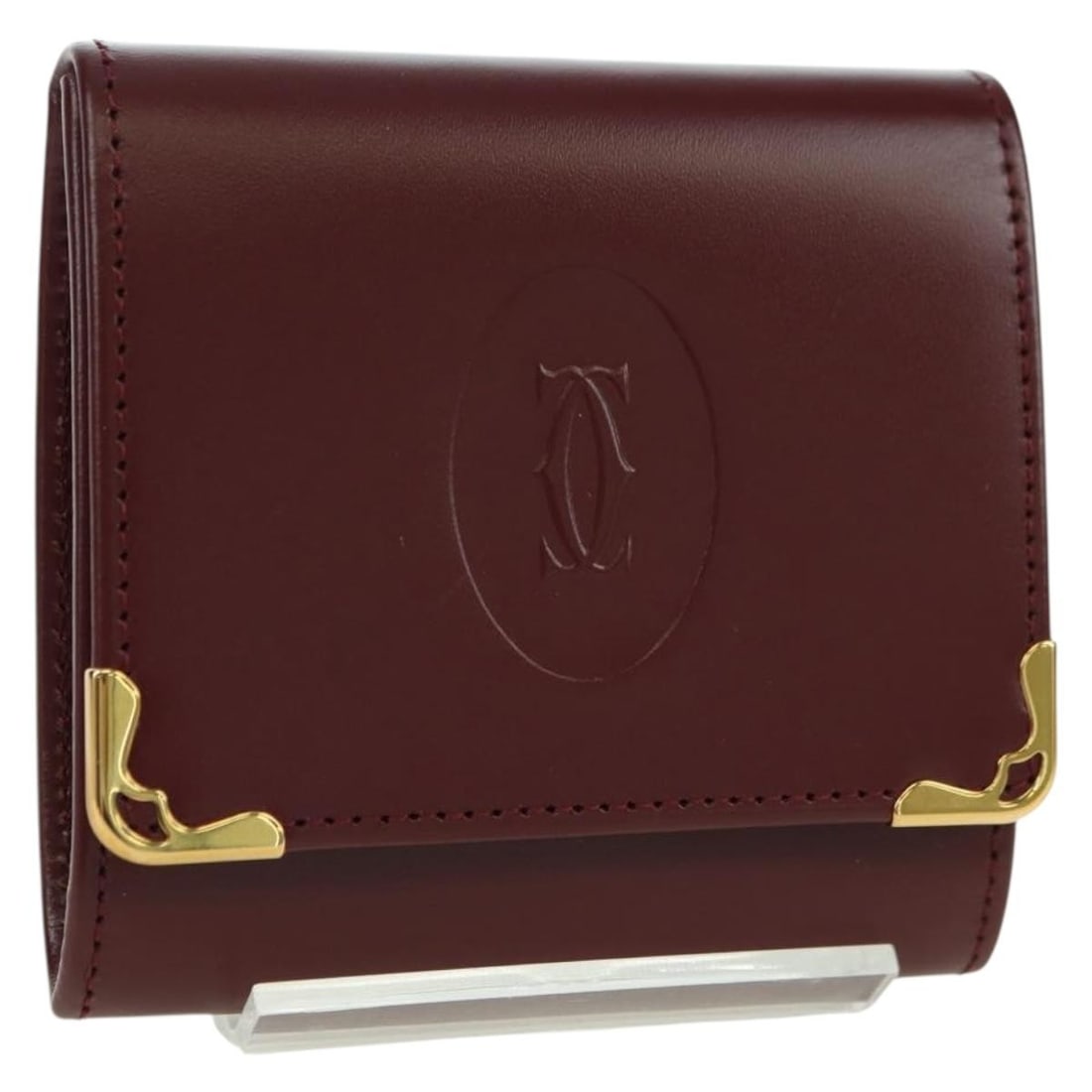 Cartier Must Line Leather Coin Purse Bordeaux Gold Tone: Cartier Must Line Leather Coin Purse Bordeaux Gold Tone Cartier Must Line coin purse in bordeaux leather with gold-tone detailing. This women's accessory is made in France and includes the dust bag, i