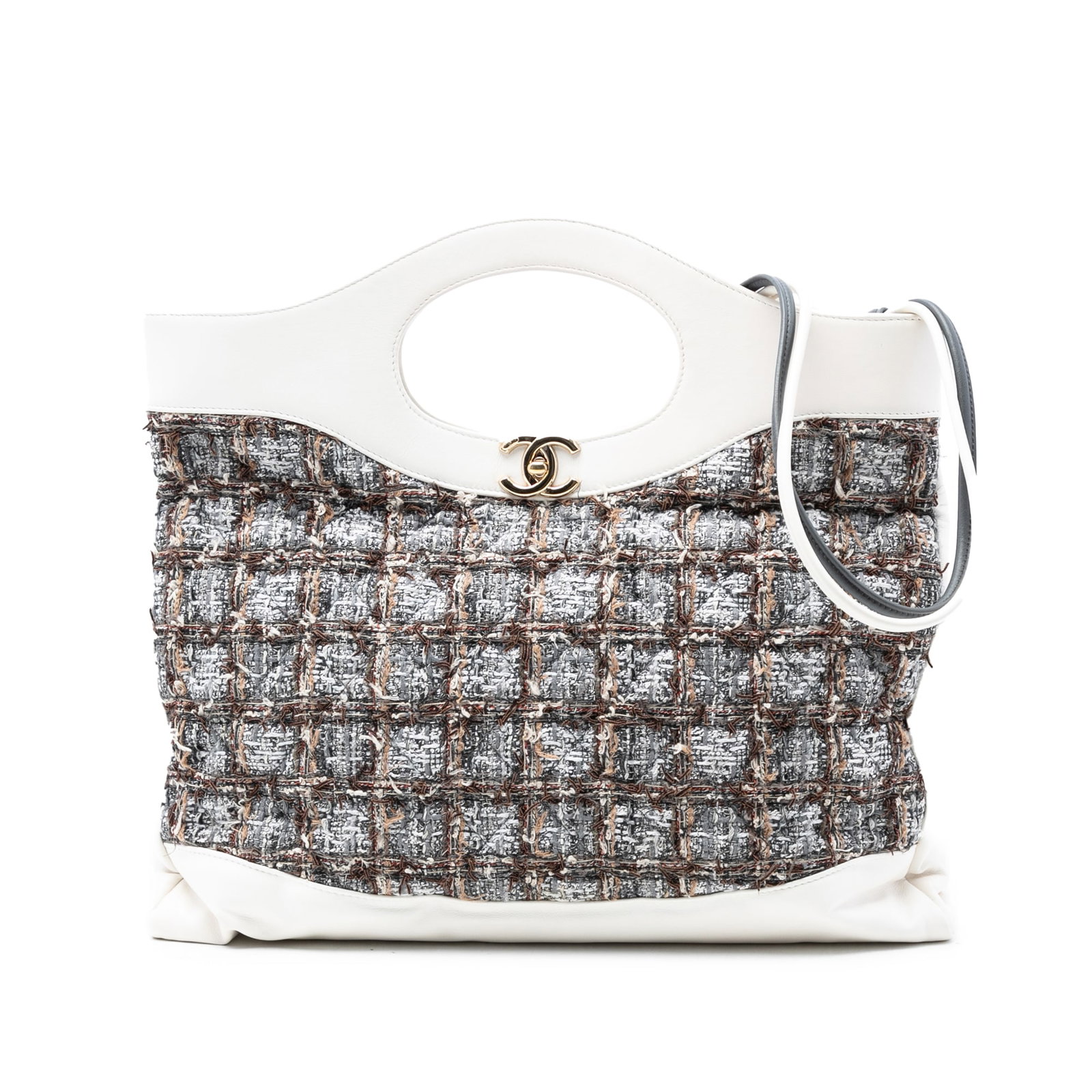 Chanel 31 Tweed Shopping Tote Gray Leather Strap: Chanel 31 Tweed Shopping Tote Gray Leather Strap This Chanel Large Tweed 31 Shopping Bag showcases a sophisticated gray tweed fabric body complemented by flat cutout handles and a leather strap. The