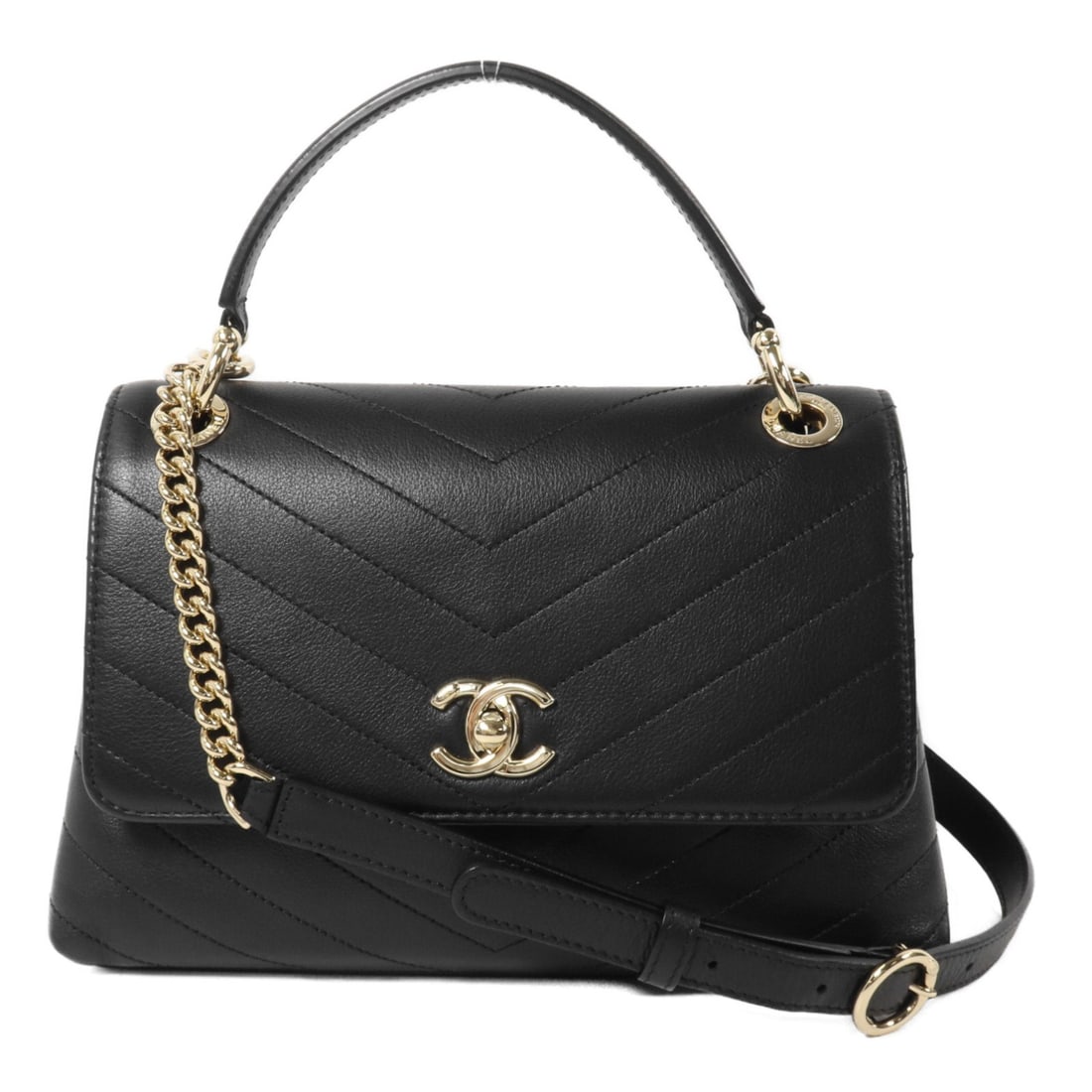 CHANEL A57147 2 Way Shoulder Bag Black Calfskin CC Chain Flap: CHANEL A57147 2 Way Shoulder Bag Black Calfskin CC Chain Flap CHANEL top handle flap bag in black calfskin with a 2-way design that can be carried by the handle or worn with the chain shoulder strap. 