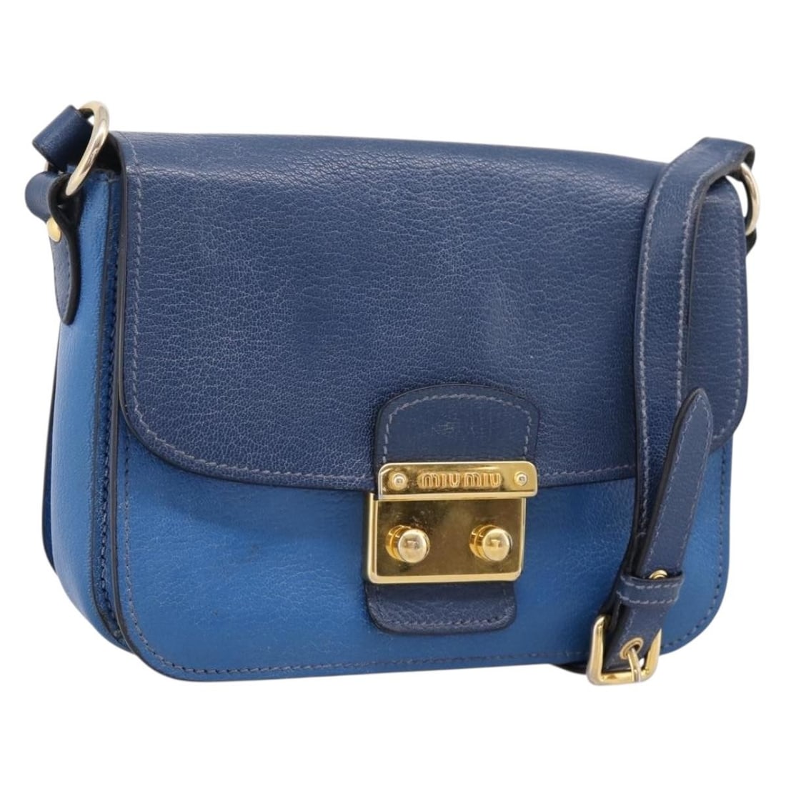 Miu Miu Leather Shoulder Bag in Navy with Gold Tone Hardware: Miu Miu Leather Shoulder Bag in Navy with Gold Tone Hardware Authentic Miu Miu shoulder bag in navy leather with gold tone accents. Made in Italy, this women's bag includes the item only; box and dust
