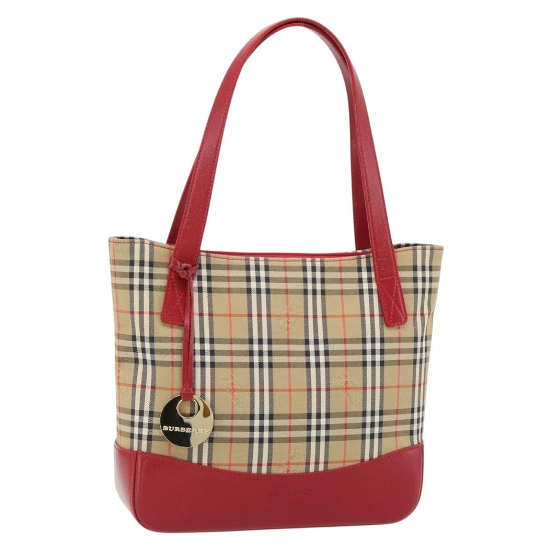 Burberry canvas tote handbag in beige gold with dust bag: Burberry canvas tote handbag in beige gold with dust bag Burberry tote bag in beige and gold canvas with the Nova Check pattern. Includes a dust bag. Condition is B with reasonable wear and tear, incl