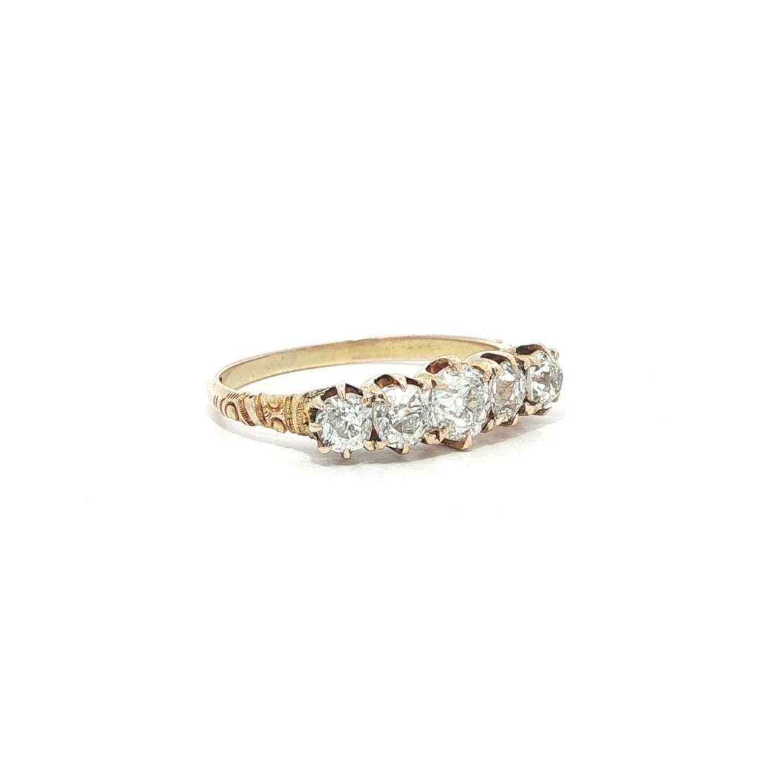 Antique Victorian 5 Stone Diamond Band Ring in Yellow Gold: Antique Victorian 5 Stone Diamond Band Ring in Yellow Gold This exquisite Antique Victorian Band Ring showcases five stunning old mine cut diamonds, totaling approximately 1.20 carats. Set in solid ye