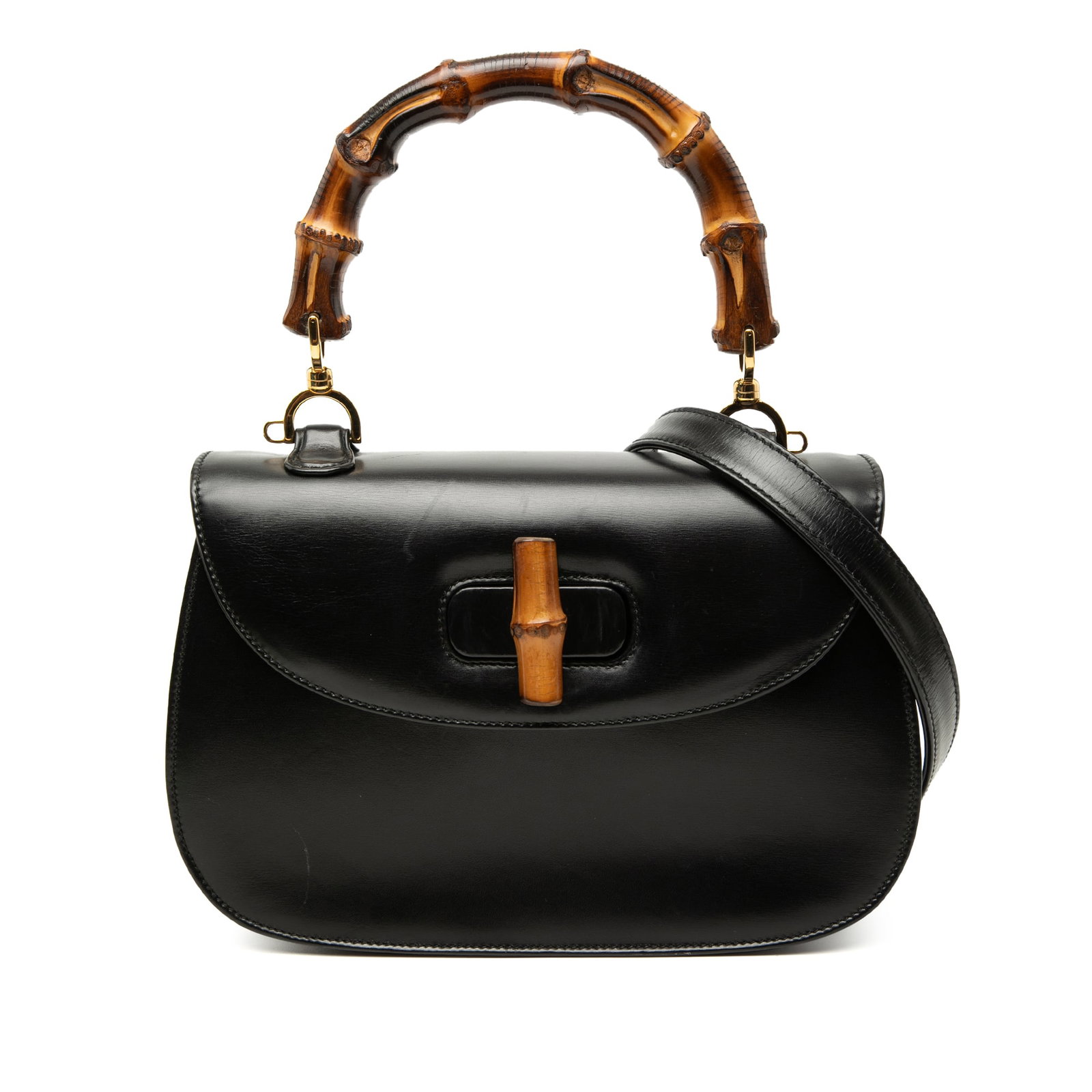 Gucci Bamboo Night black leather top handle shoulder bag: Gucci Bamboo Night black leather top handle shoulder bag Gucci Calfskin Bamboo Night bag in black leather with a bamboo top handle, detachable flat leather shoulder strap, and flap closure with bamboo