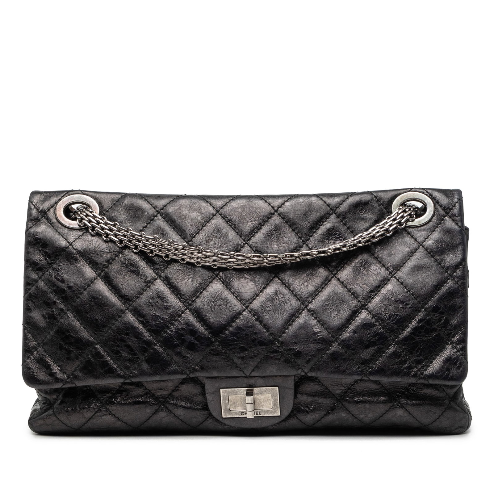 Chanel Reissue 2.55 228 quilted aged calfskin flap bag: Chanel Reissue 2.55 228 quilted aged calfskin flap bag Chanel Reissue 2.55 Double Flap 228 in black quilted aged calfskin. This bag features chain link shoulder straps, double front flaps with a twist