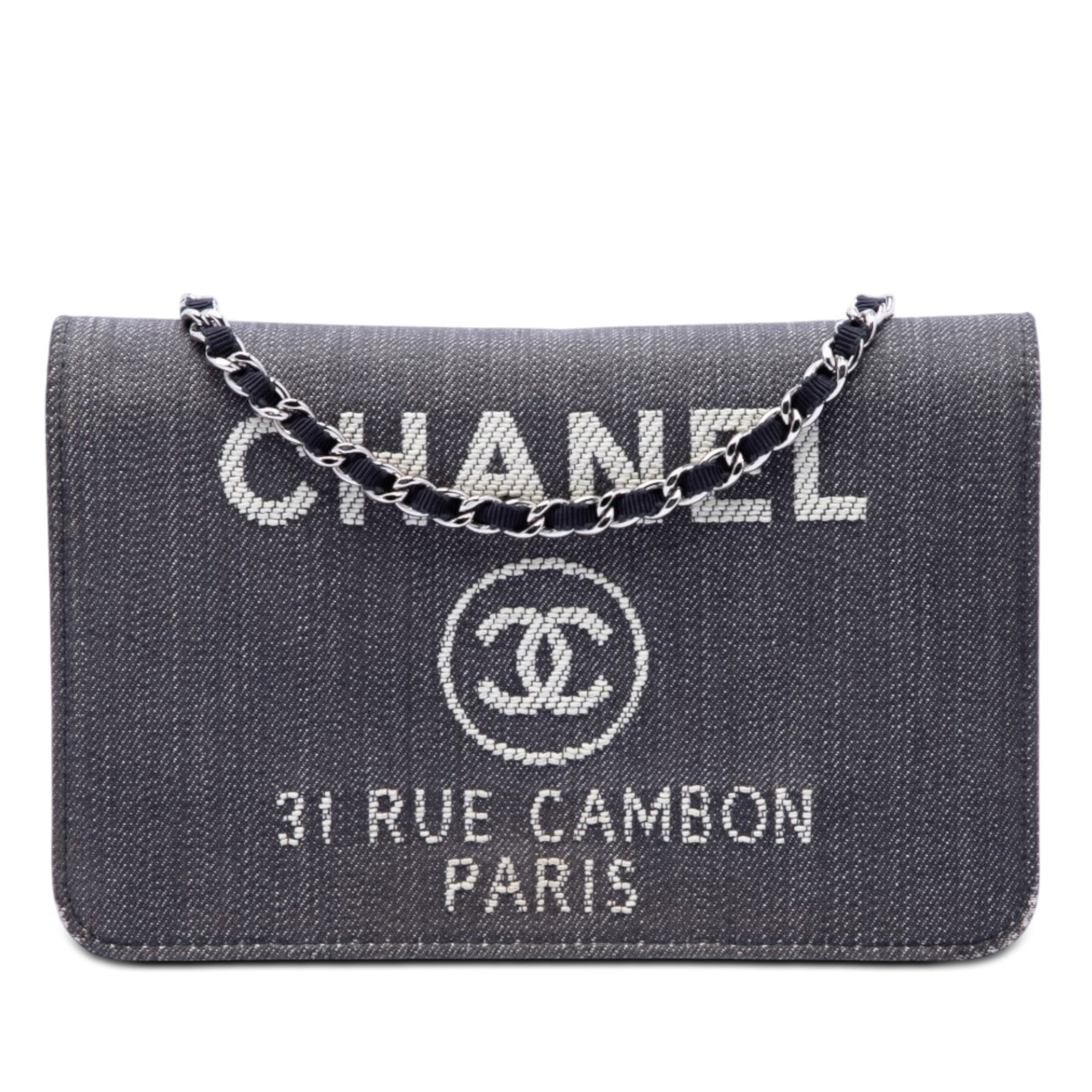 Chanel Deauville denim wallet on chain bag blue: Chanel Deauville denim wallet on chain bag blue Chanel Denim Deauville Wallet On Chain in blue fabric with a grosgrain woven chain strap and front flap with magnetic closure. The interior includes zip