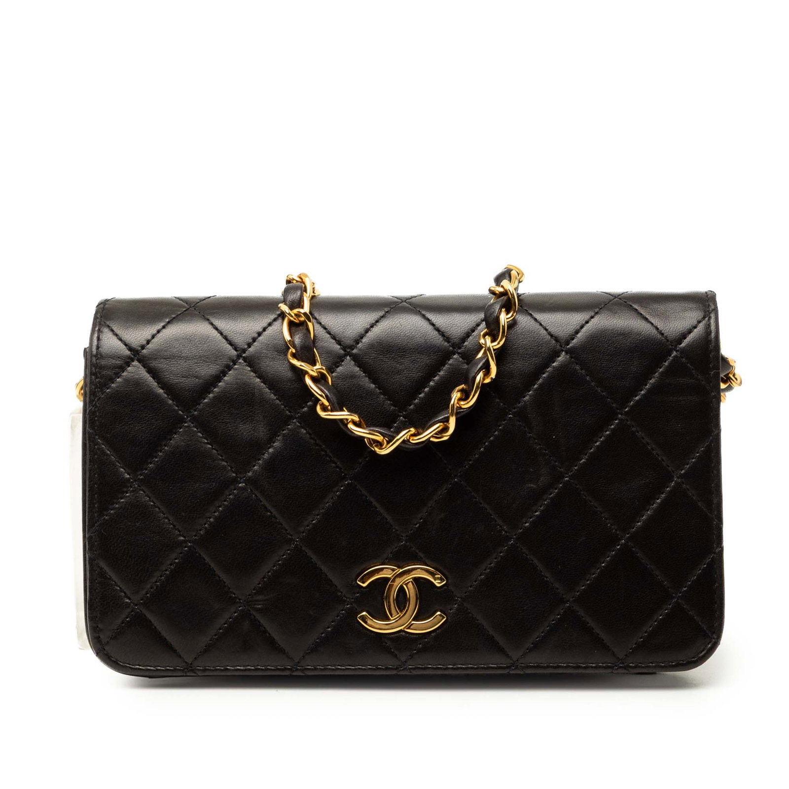 Chanel Mini CC Full Flap Quilted Lambskin Crossbody Bag: Chanel Mini CC Full Flap Quilted Lambskin Crossbody Bag Chanel Mini CC Quilted Lambskin Full Flap crossbody bag in black quilted lambskin leather. It features a leather-woven chain shoulder strap, a f