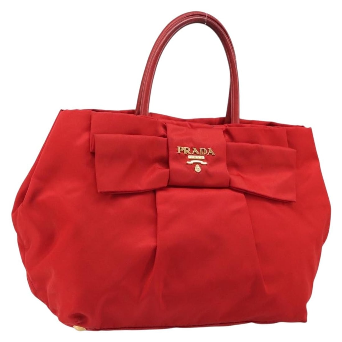 PRADA Red Nylon Handbag Gold Tone Hardware Italy: PRADA Red Nylon Handbag Gold Tone Hardware Italy Prada nylon handbag in red with gold-tone accents, made in Italy. This women's handbag includes only the item shown; the original box and dust bag are 