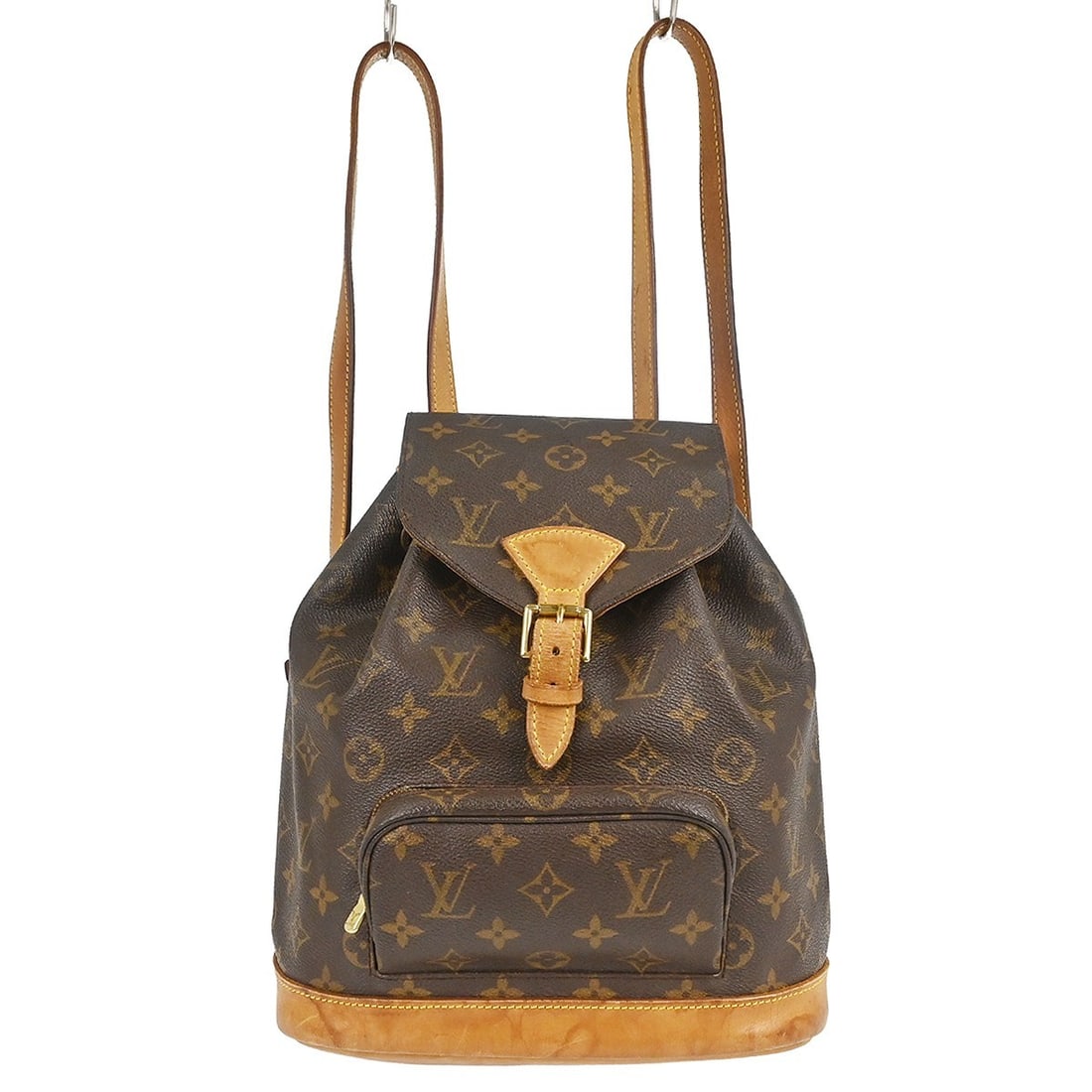 Louis Vuitton Vintage Montsouris Monogram Canvas Backpack: Louis Vuitton Vintage Montsouris Monogram Canvas Backpack Vintage Louis Vuitton Montsouris backpack in brown monogram canvas. This unisex piece is made in France and shows fair overall condition with 