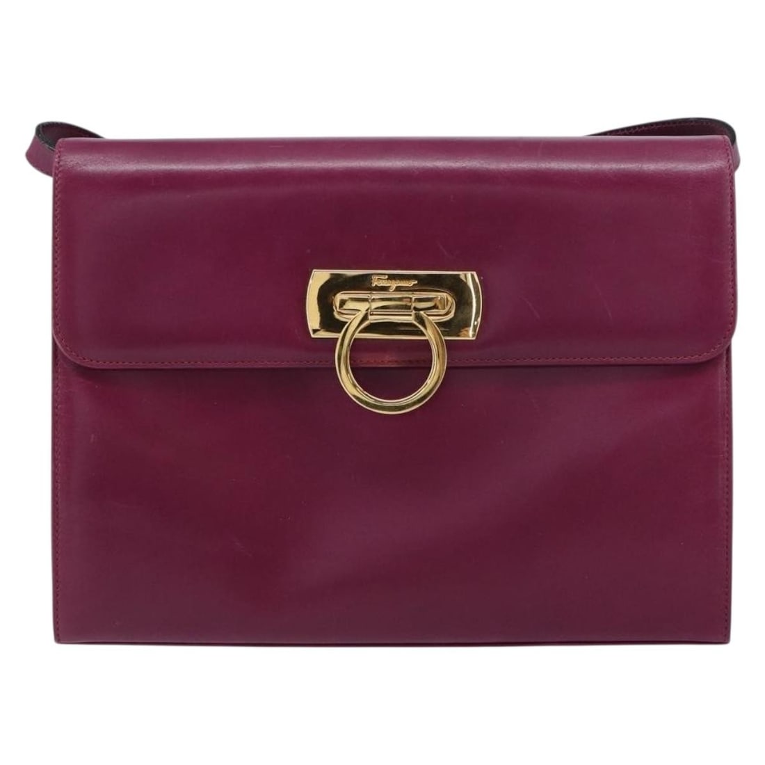 Purple Leather Shoulder Bag Salvatore Ferragamo Gancini: Purple Leather Shoulder Bag Salvatore Ferragamo Gancini This Salvatore Ferragamo Gancini shoulder bag is crafted from purple leather and designed specifically for women. The bag features a structured 