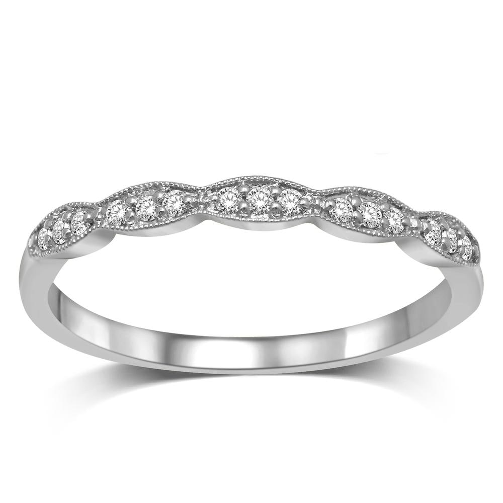 14K White Gold 1/10 Ct.Tw. Diamond Stackable Band: 14K White Gold 1/10 Ct.Tw. Diamond Stackable Band This Amazing Stackable band Is Available In 14K White Gold. There Are 15 Round Diamonds With A Total Carat Weight Of 1/10 Ct.Tw. Set In A Shared Prong