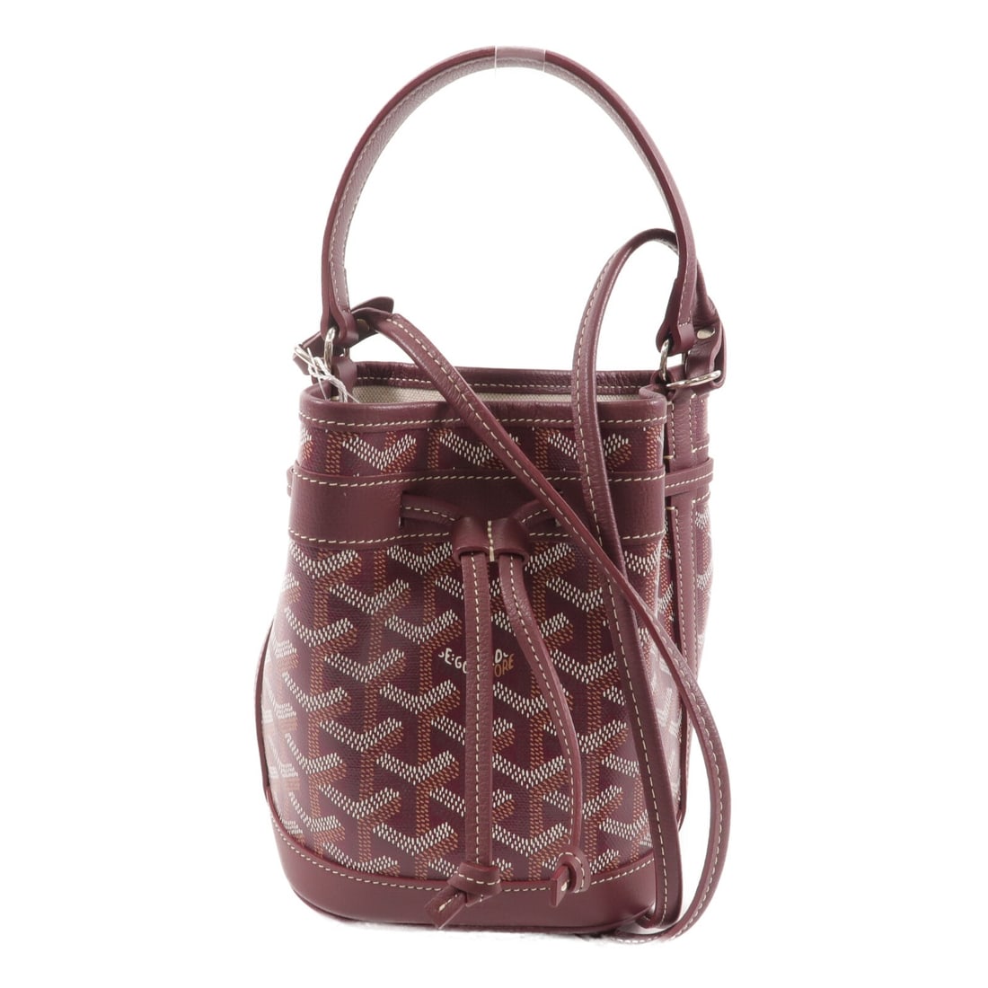 Goyard Petit Flot 2 Way Bucket Bag Red Bordeaux Coated Canvas: Goyard Petit Flot 2 Way Bucket Bag Red Bordeaux Coated Canvas Petit Flot bucket bag in red and Bordeaux red PVC coated canvas with silver-tone hardware. This 2-way shoulder bag includes a shoulder str