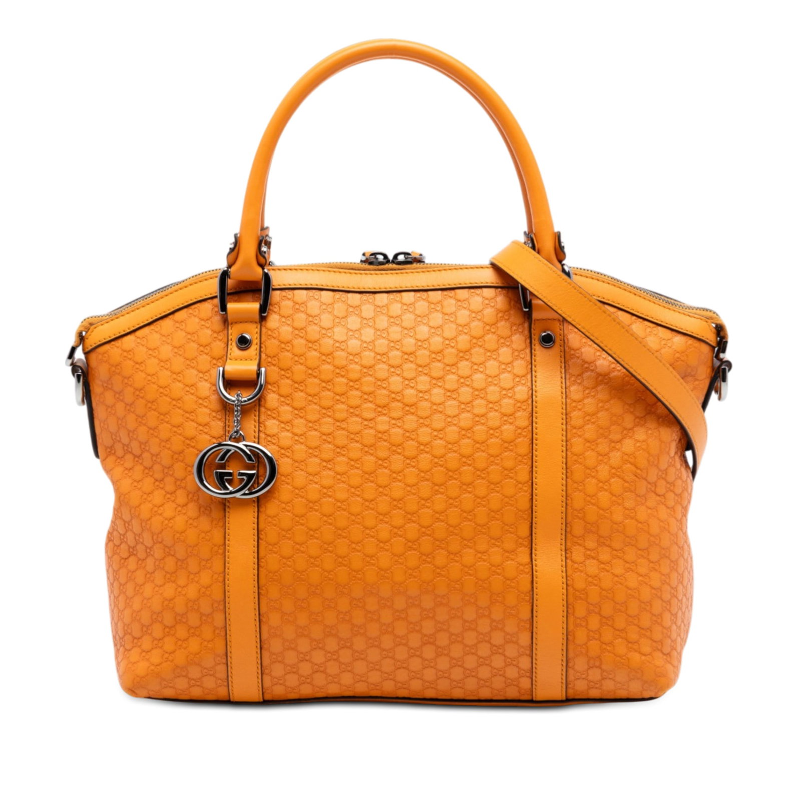 Gucci orange leather dome satchel with GG charm: Gucci orange leather dome satchel with GG charm This Gucci Medium Microguccissima GG Charm Dome Satchel is crafted from embossed orange leather and features rolled leather handles, a detachable and ad