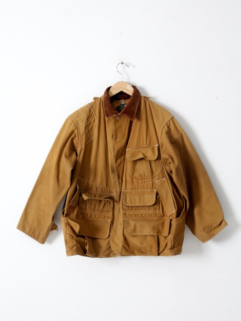 1950s Hinson Bodyguard Hunting Jacket Brown Canvas Multiple Pockets: 1950s Hinson Bodyguard Hunting Jacket Brown Canvas Multiple Pockets Discover a classic piece of outdoor heritage with this 1950s vintage Hinson "Bodyguard" hunting jacket. Crafted from durable brown c