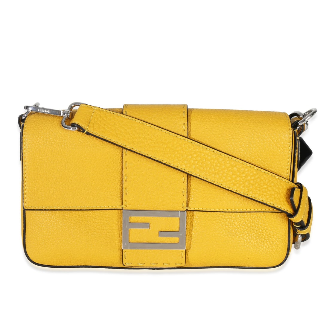 Fendi Selleria Belt Baguette Yellow Leather Crossbody Shoulder Bag: Fendi Selleria Belt Baguette Yellow Leather Crossbody Shoulder Bag This Fendi Selleria Belt Baguette Bag features a striking yellow leather exterior with a silver-tone magnetic snap closure. Designed 