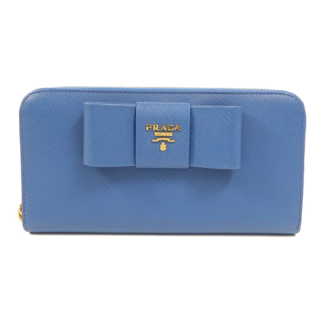 PRADA 1ML506 Fiocco Bow Wallet Blue Saffiano Leather: PRADA 1ML506 Fiocco Bow Wallet Blue Saffiano Leather A PRADA Fiocco Bow long wallet, model 1ML506, crafted in Saffiano leather in BluexBlue. It features a fastener closure, three open compartments, 12