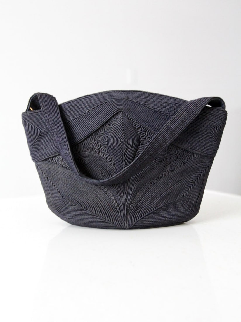 1940s Vintage Corde Handbag Navy Rayon Art Deco Design: 1940s Vintage Corde Handbag Navy Rayon Art Deco Design Step back in time with this exquisite 1940s vintage Corde handbag. Crafted from 100% rayon, this elegant navy evening bag showcases a classic cor