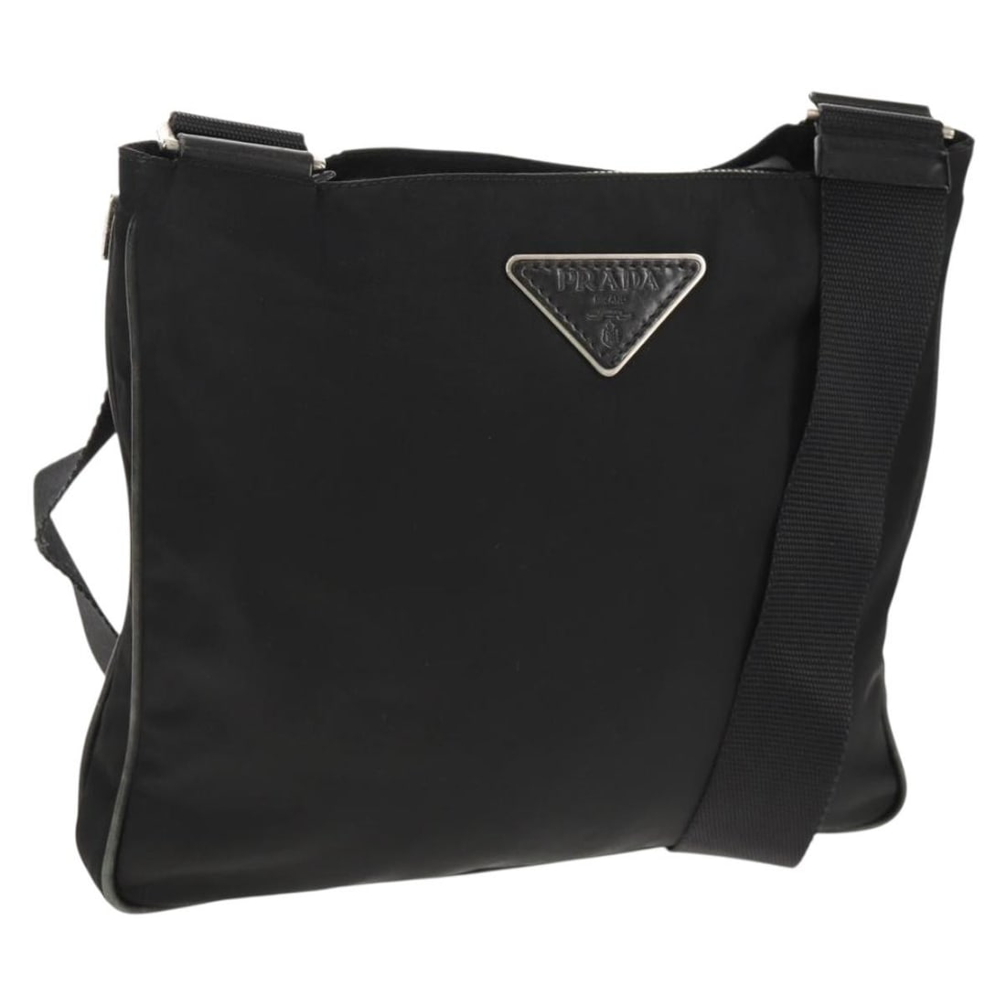 Prada Nylon Shoulder Bag in Black with Silver Tone Dust Bag: Prada Nylon Shoulder Bag in Black with Silver Tone Dust Bag Authentic Prada shoulder bag in black nylon with silver-tone accents. Made in Italy, this women's bag includes a dust bag and features an ad
