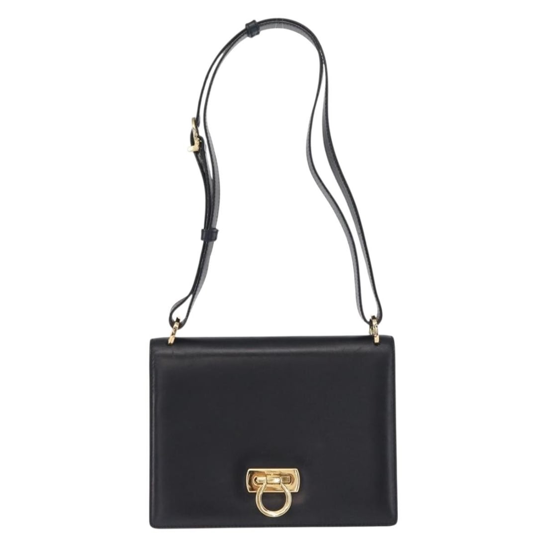 Salvatore Ferragamo Gancini Navy Leather Shoulder Bag: Salvatore Ferragamo Gancini Navy Leather Shoulder Bag This Salvatore Ferragamo Gancini shoulder bag is crafted from navy leather and features a structured silhouette. Designed for women, it includes a