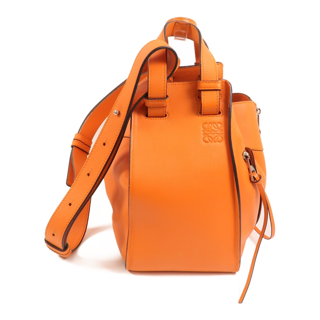 LOEWE Hammock Small 2way Shoulder Bag Orange Calfskin Leather: LOEWE Hammock Small 2way Shoulder Bag Orange Calfskin Leather LOEWE Hammock Small 2-way shoulder bag in orange calfskin (cowhide). This women's bag is from Spain and comes with a storage bag. It featu