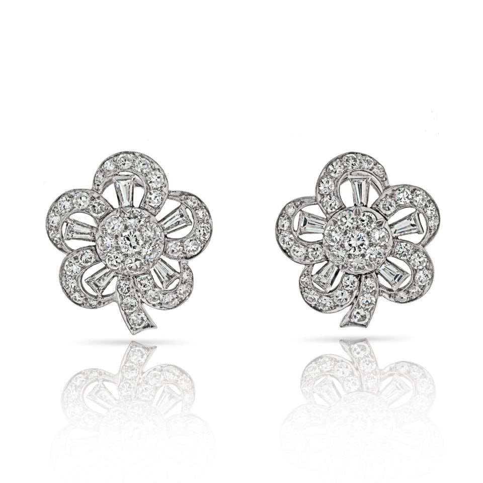 Retro Platinum 8.5 Carat Baguette Round Cut Diamond Earrings: Retro Platinum 8.5 Carat Baguette Round Cut Diamond Earrings Discover the elegance of these Retro Platinum Earrings, featuring an exquisite design adorned with both baguette and round cut diamonds. Cr