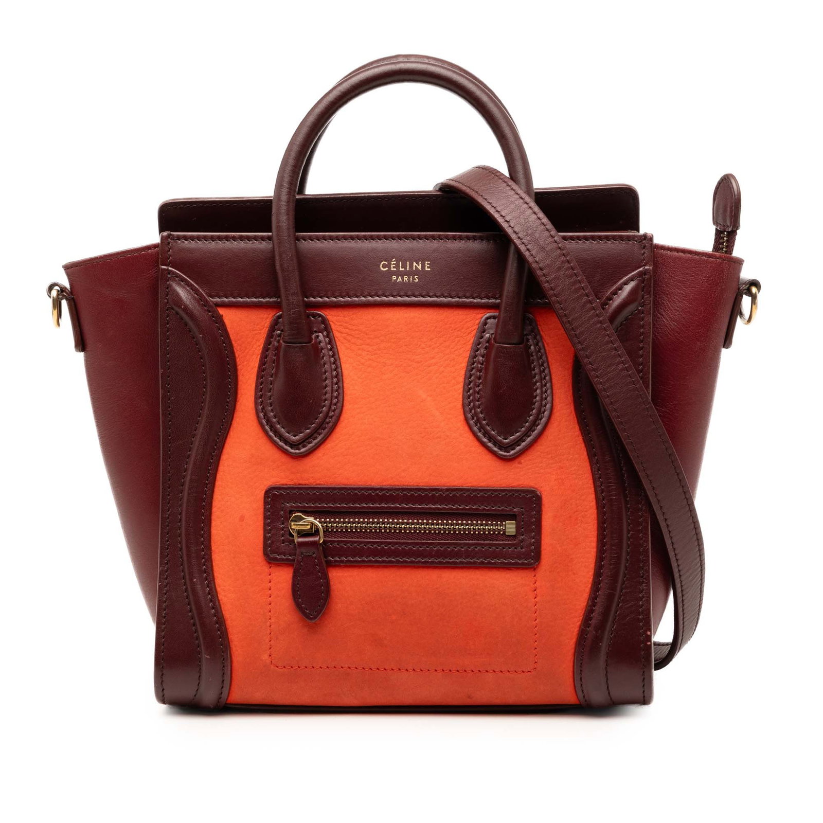 Celine Nano Luggage Tote in Tricolor Nubuck and Calfskin Leather: Celine Nano Luggage Tote in Tricolor Nubuck and Calfskin Leather This Celine Nano Tricolor Luggage Tote is crafted from nubuck and calfskin leather in a vibrant orange hue. It features rolled leather 