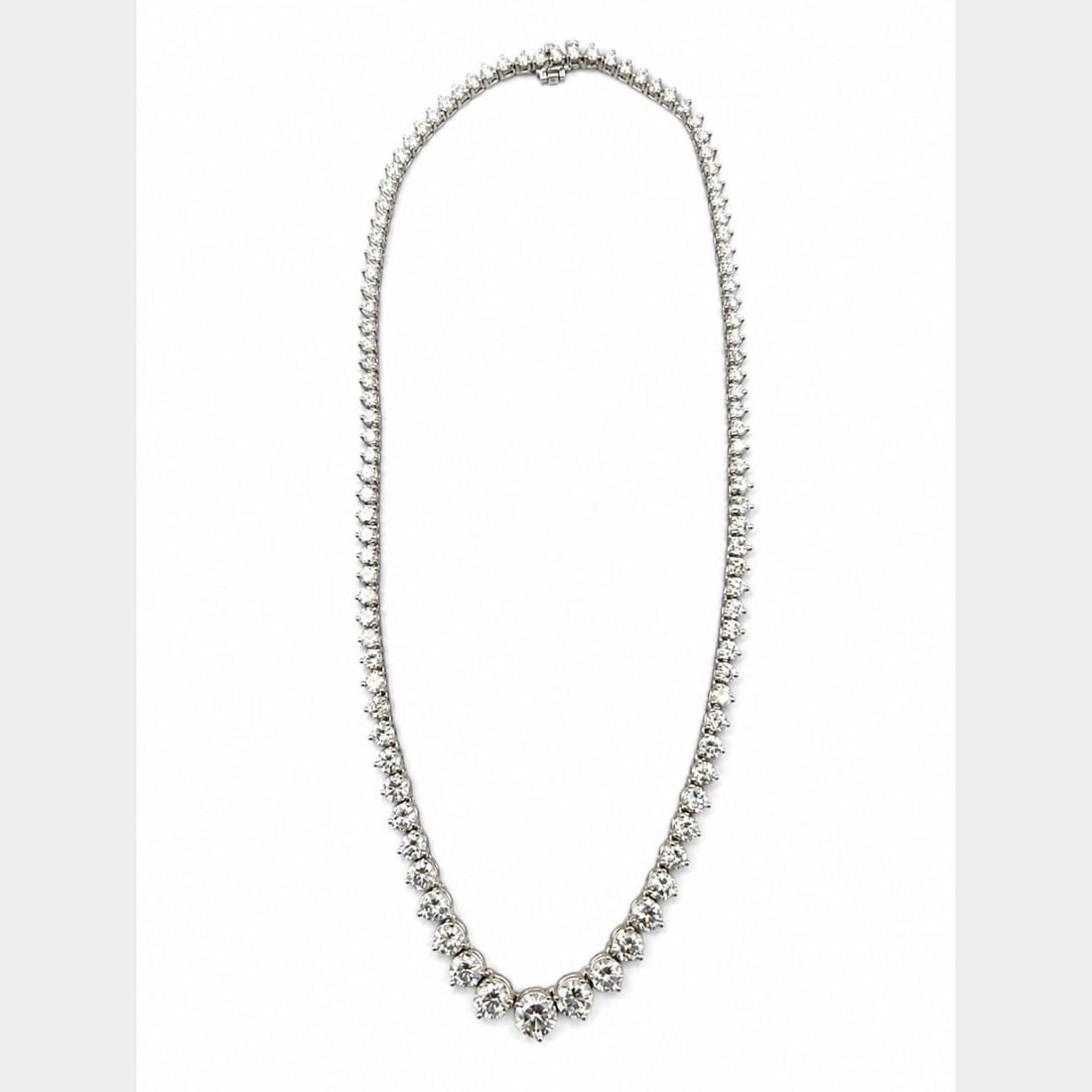 GIA Certified 14K White Gold Diamond Necklace with 1.41 Ct Center Stone: GIA Certified 14K White Gold Diamond Necklace with 1.41 Ct Center Stone Pre-owned graduated diamond necklace crafted in 14K white gold and centered with a GIA certified diamond, accented by additional