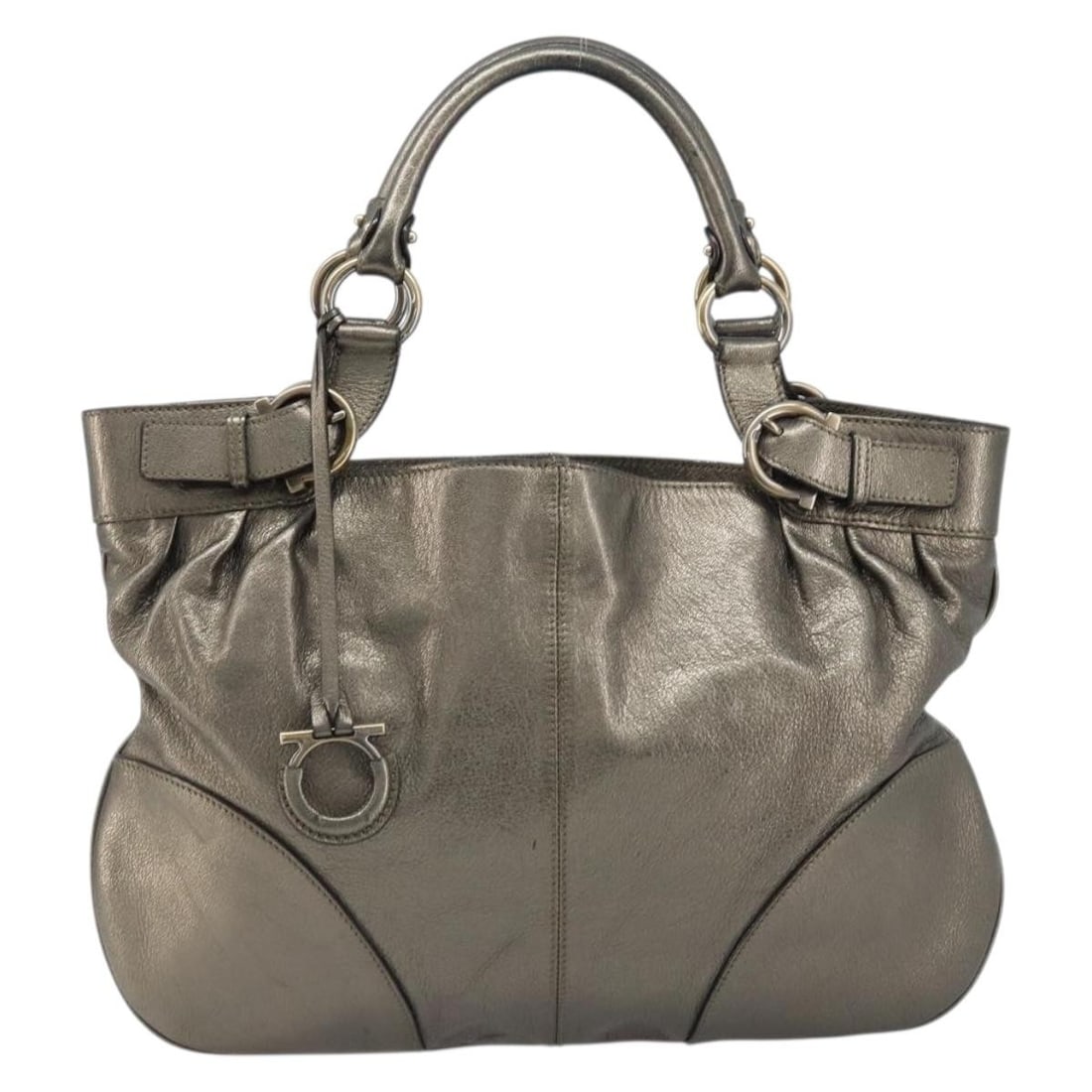Gold Leather Handbag Salvatore Ferragamo Gancini: Gold Leather Handbag Salvatore Ferragamo Gancini This Salvatore Ferragamo Gancini handbag is crafted from leather in a gold color and designed for women. It features a spacious interior and showcases 