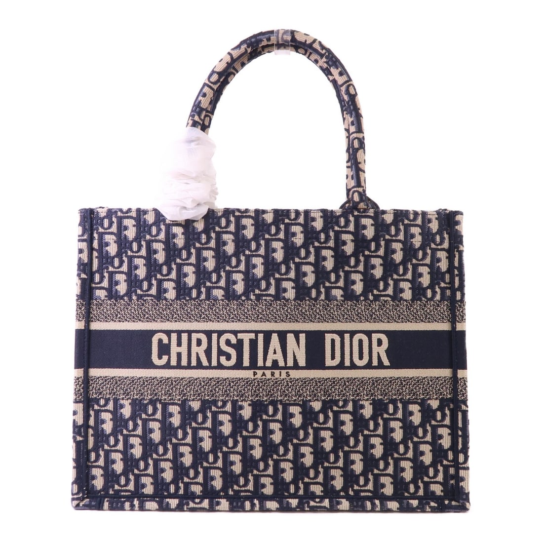 Dior M1296ZRIW Medium Tote Bag CD Book Tote Blue Canvas: Dior M1296ZRIW Medium Tote Bag CD Book Tote Blue Canvas Medium Christian Dior Book Tote bag in blue canvas with dual top handles. This women's tote is made in Italy and comes with storage bags and a g