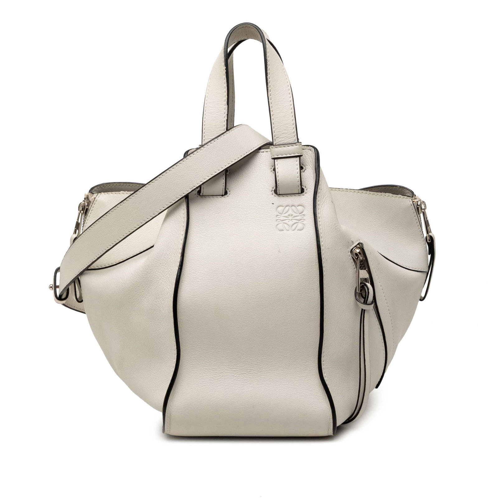 Loewe Hammock Small White Leather Satchel with Top Handles and Strap: Loewe Hammock Small White Leather Satchel with Top Handles and Strap This LOEWE Small Leather Hammock Satchel features a white leather body with flat leather handles and a flat leather strap. The bag 