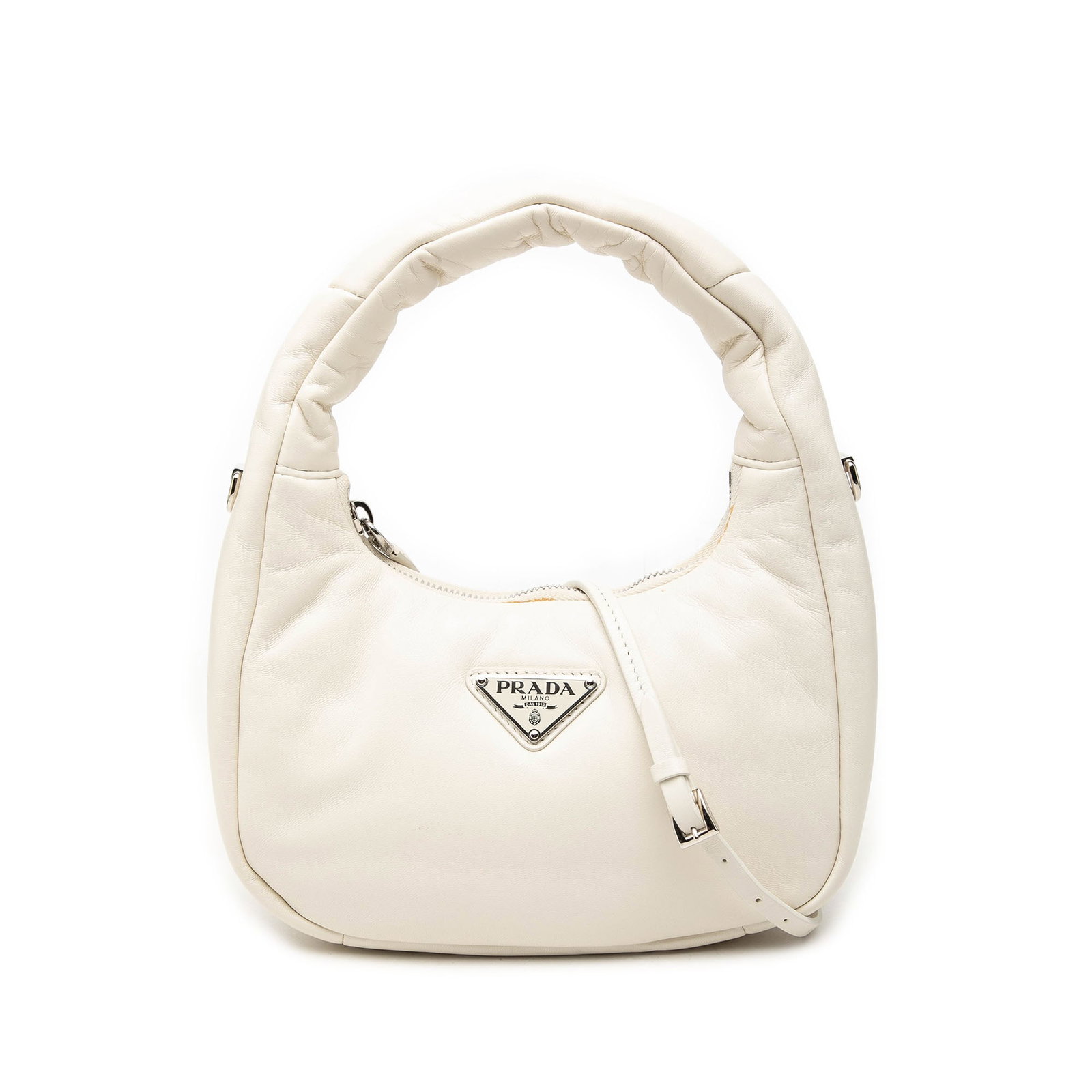 Prada Mini Nappa Soft Padded Satchel White Leather: Prada Mini Nappa Soft Padded Satchel White Leather Prada Mini Nappa Soft Padded Bag crafted in white nappa leather with flat handles, a detachable flat strap, and a top zip closure. Includes a dust ba