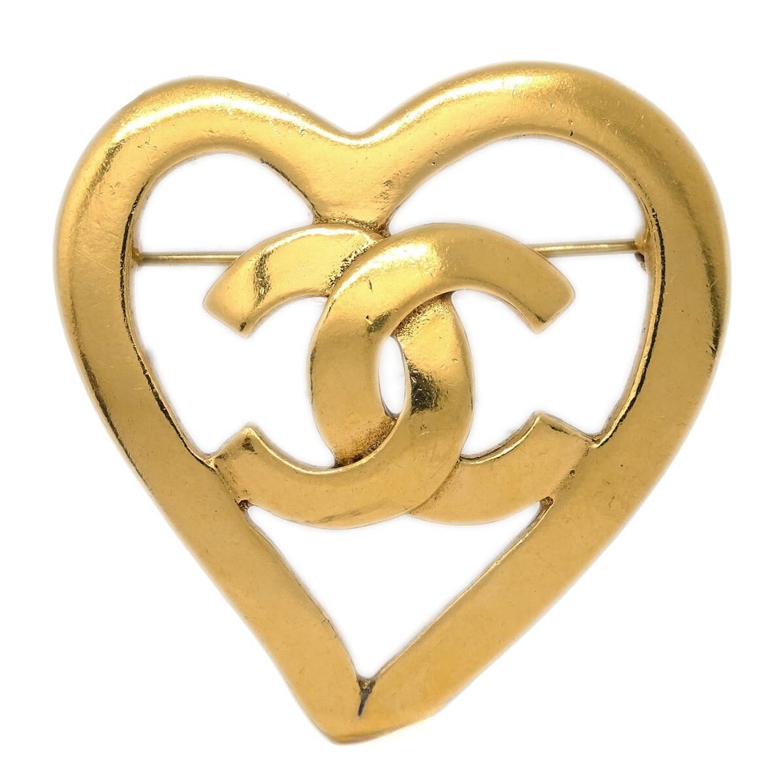Chanel 95P Gold Plated CC Heart Brooch: Chanel 95P Gold Plated CC Heart Brooch Gold-plated Chanel brooch in a heart shape with the interlocking CC logo motif. Made in France, this piece is marked 95P and presents in very good condition with