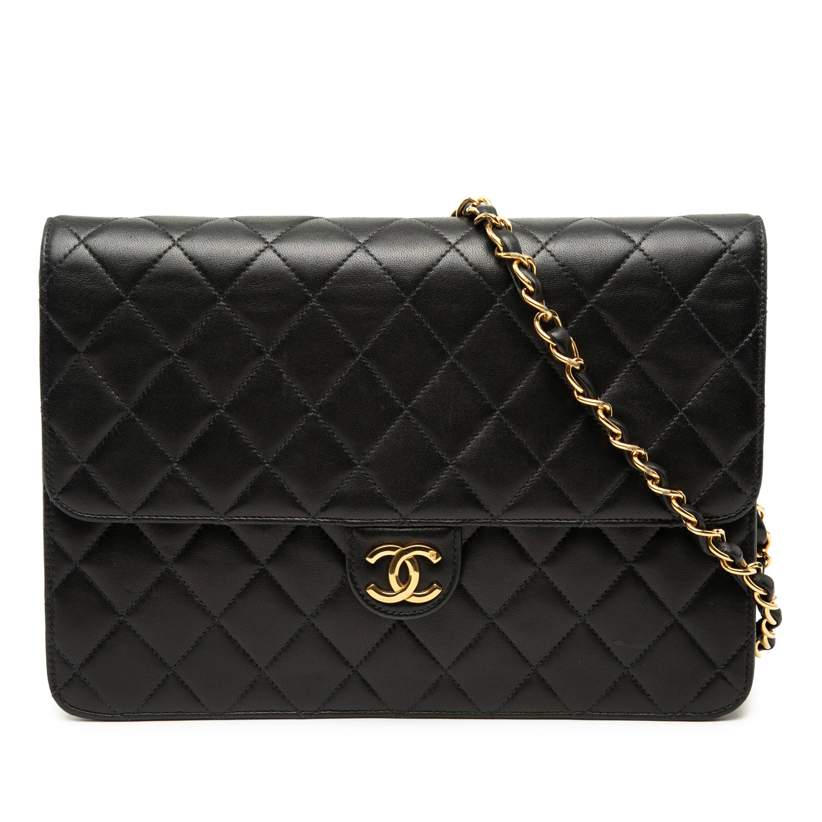 Chanel Medium Single Flap Shoulder Bag Black Quilted Lambskin: Chanel Medium Single Flap Shoulder Bag Black Quilted Lambskin A Chanel Medium CC Quilted Lambskin Single Flap shoulder bag in black, crafted with a quilted lambskin leather body and a leather-woven ch