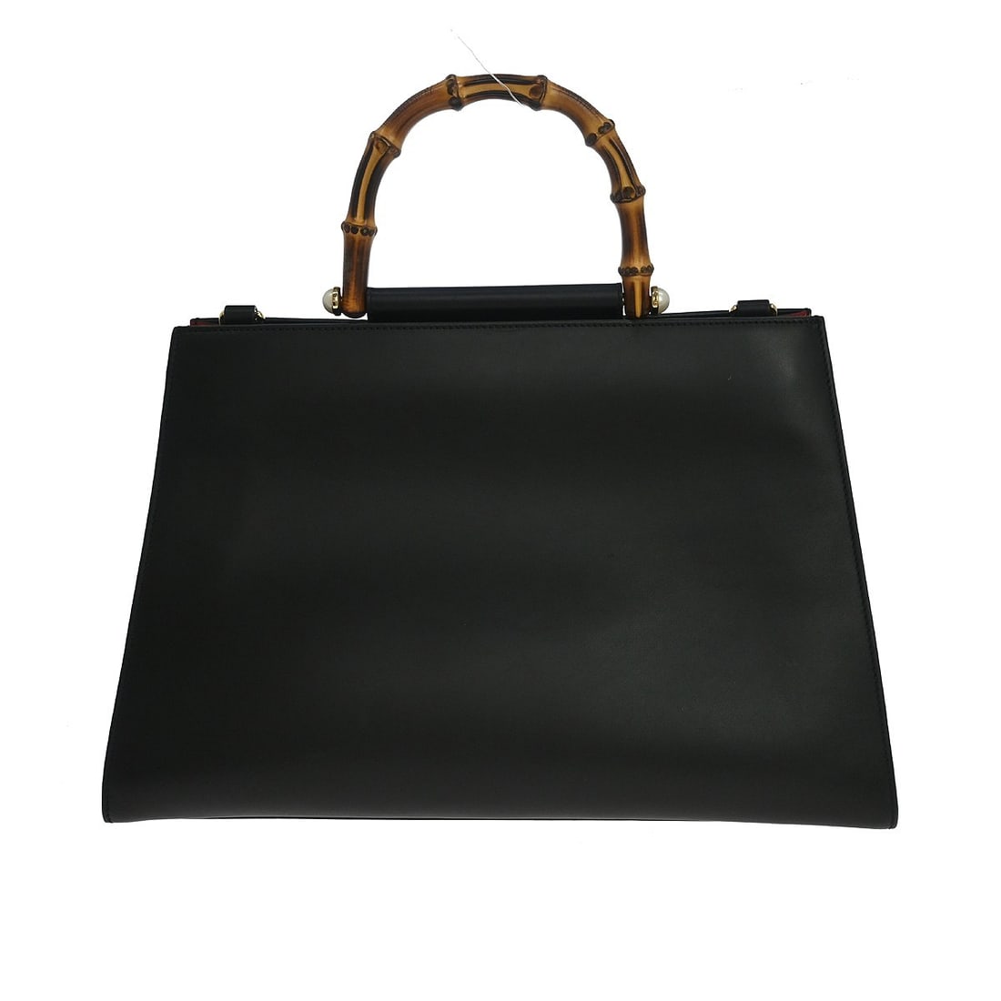 Gucci Bamboo medium top handle bag in black leather: Gucci Bamboo medium top handle bag in black leather Vintage Gucci Bamboo top handle handbag in black leather with bamboo handles and a black leather lining. The bag features interior pocket storage wi