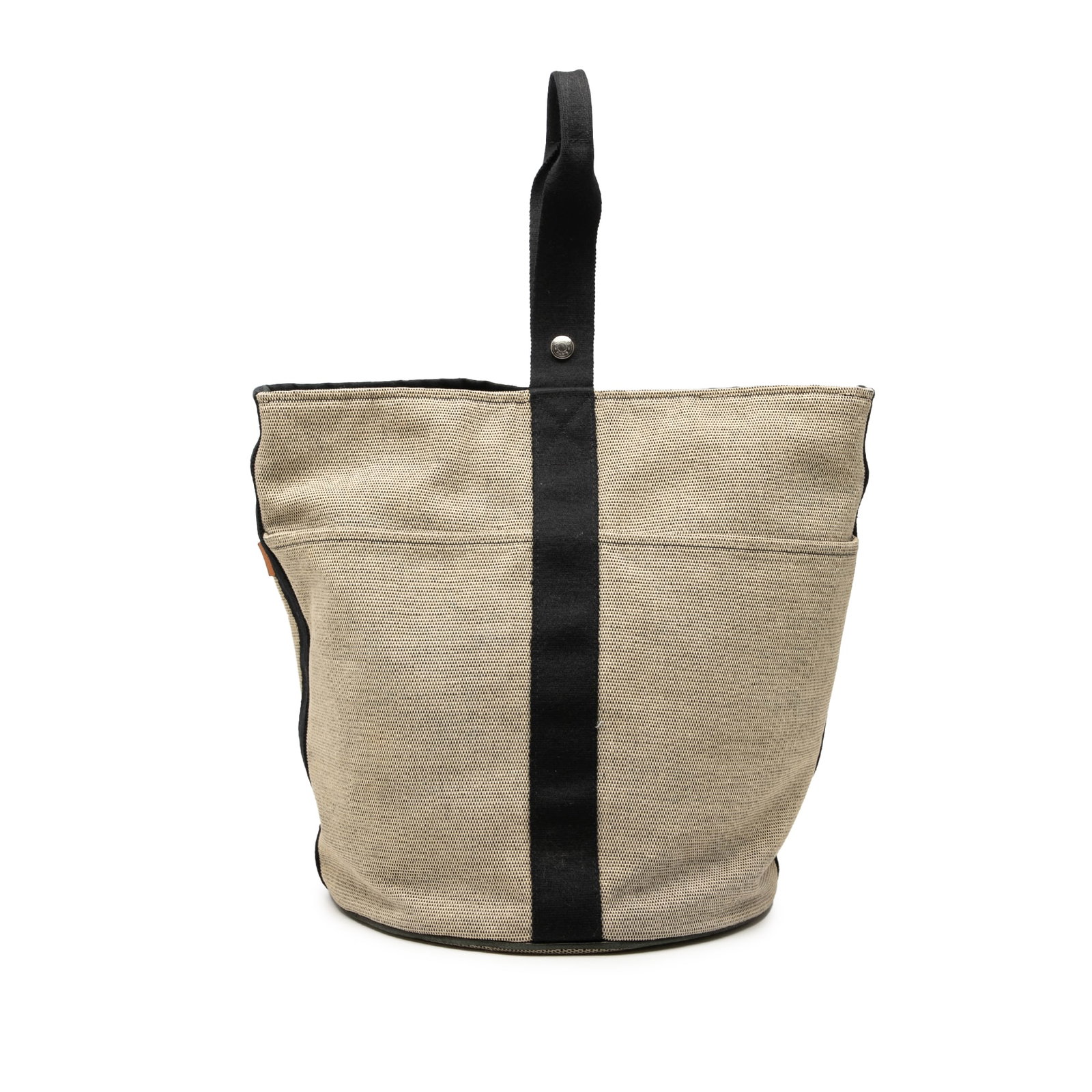 Hermes Toile Saxo GM canvas tote bag beige: Hermes Toile Saxo GM canvas tote bag beige Hermes Toile Saxo GM bag with a canvas body, flat handle, open top, and magnetic snap button closure. The design includes exterior front and back slip pocket