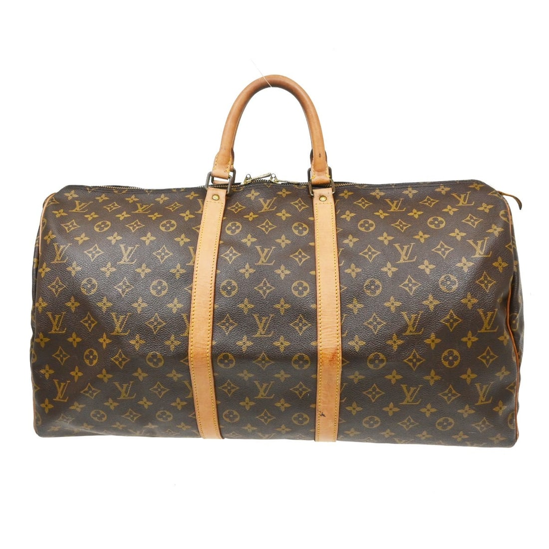 Louis Vuitton Keepall Brown Canvas Travel Bag: Louis Vuitton Keepall Brown Canvas Travel Bag Louis Vuitton Keepall in brown monogram canvas. This unisex bag is in fair condition with visible wear, including scuffs, scratches, pen marks, cracks, st