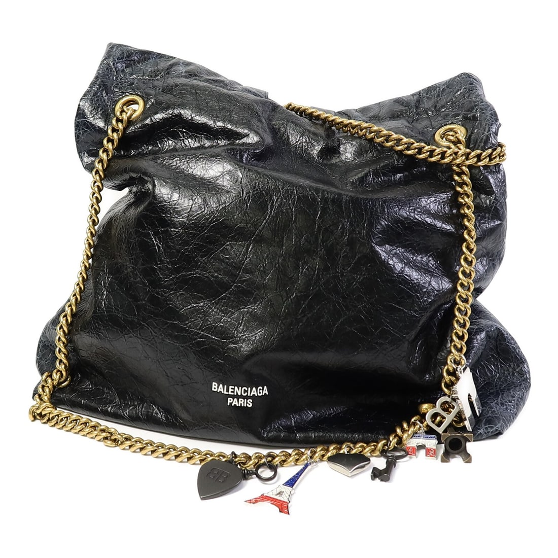 Balenciaga Crush Medium Shoulder Tote Black Lambskin Leather GHW: Balenciaga Crush Medium Shoulder Tote Black Lambskin Leather GHW Balenciaga Crush Medium Tote Bag is a black lambskin leather shoulder bag with a regular size profile and a reasonable wear and tear co