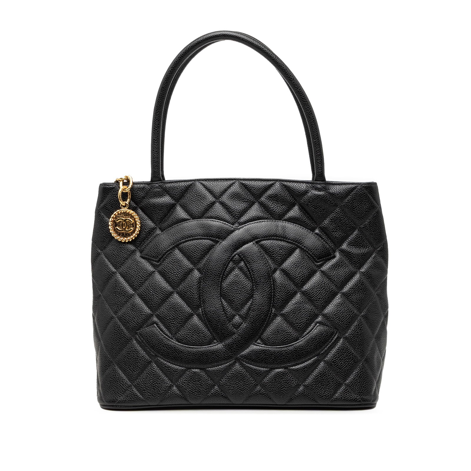 Chanel Medallion Tote Black Quilted Caviar Leather Bag: Chanel Medallion Tote Black Quilted Caviar Leather Bag Chanel Caviar Medallion Tote bag in black quilted caviar leather with rolled leather handles, a top zip closure, an exterior back slip pocket, an