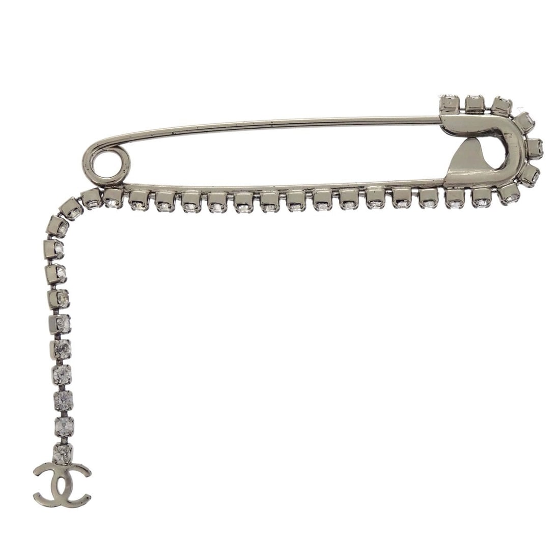 CHANEL CC Rhinestone Dangle Brooch Silver Plated France: CHANEL CC Rhinestone Dangle Brooch Silver Plated France Chanel CC dangle brooch pin in silver plated metal with rhinestone accents. Made in France, this brooch features the iconic CC motif and is pres