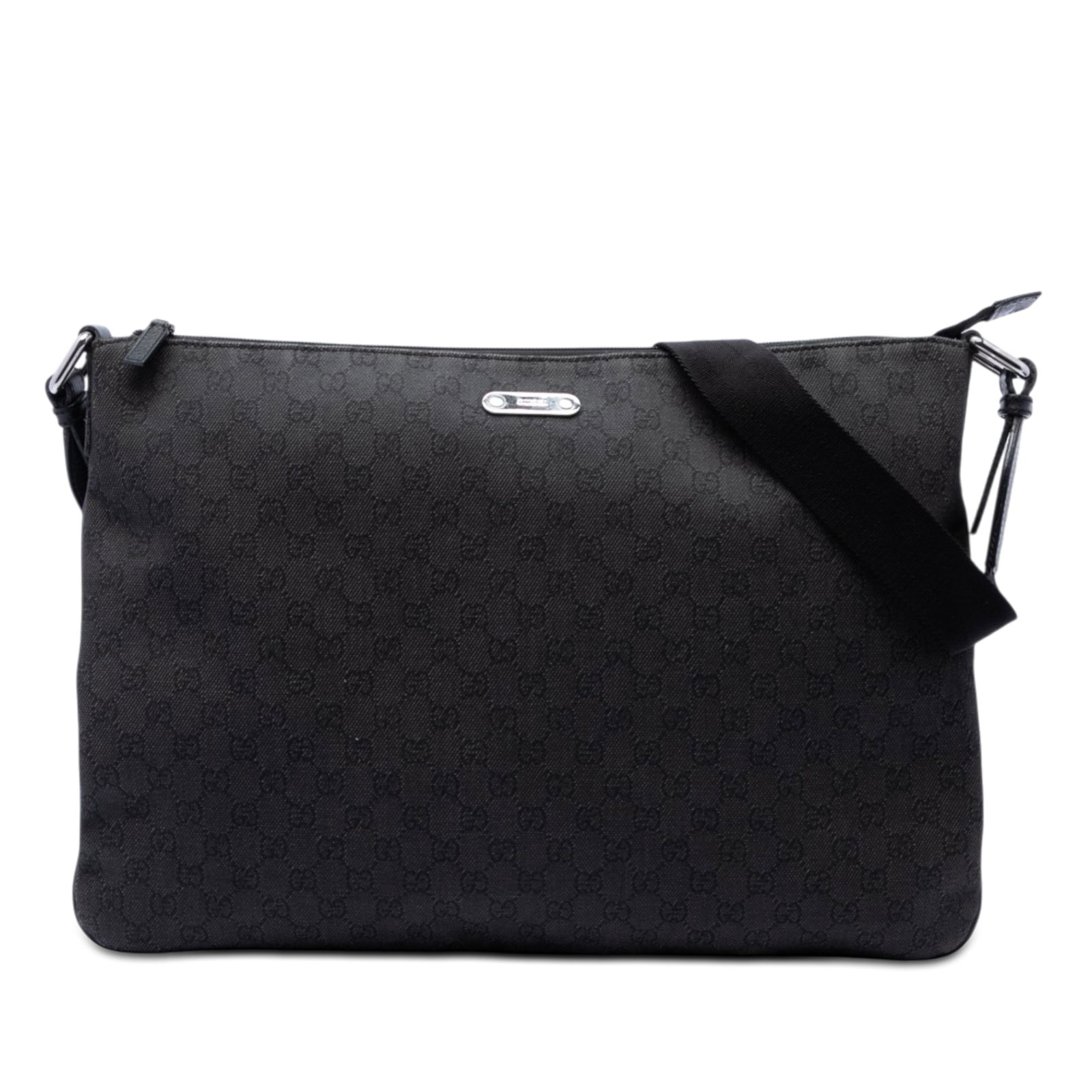 Gucci GG Denim black fabric crossbody bag: Gucci GG Denim black fabric crossbody bag Gucci GG Denim Crossbody bag in black fabric with a zip-top closure, flat strap, and an interior zip pocket. Made in Italy, this piece shows visible wear cons