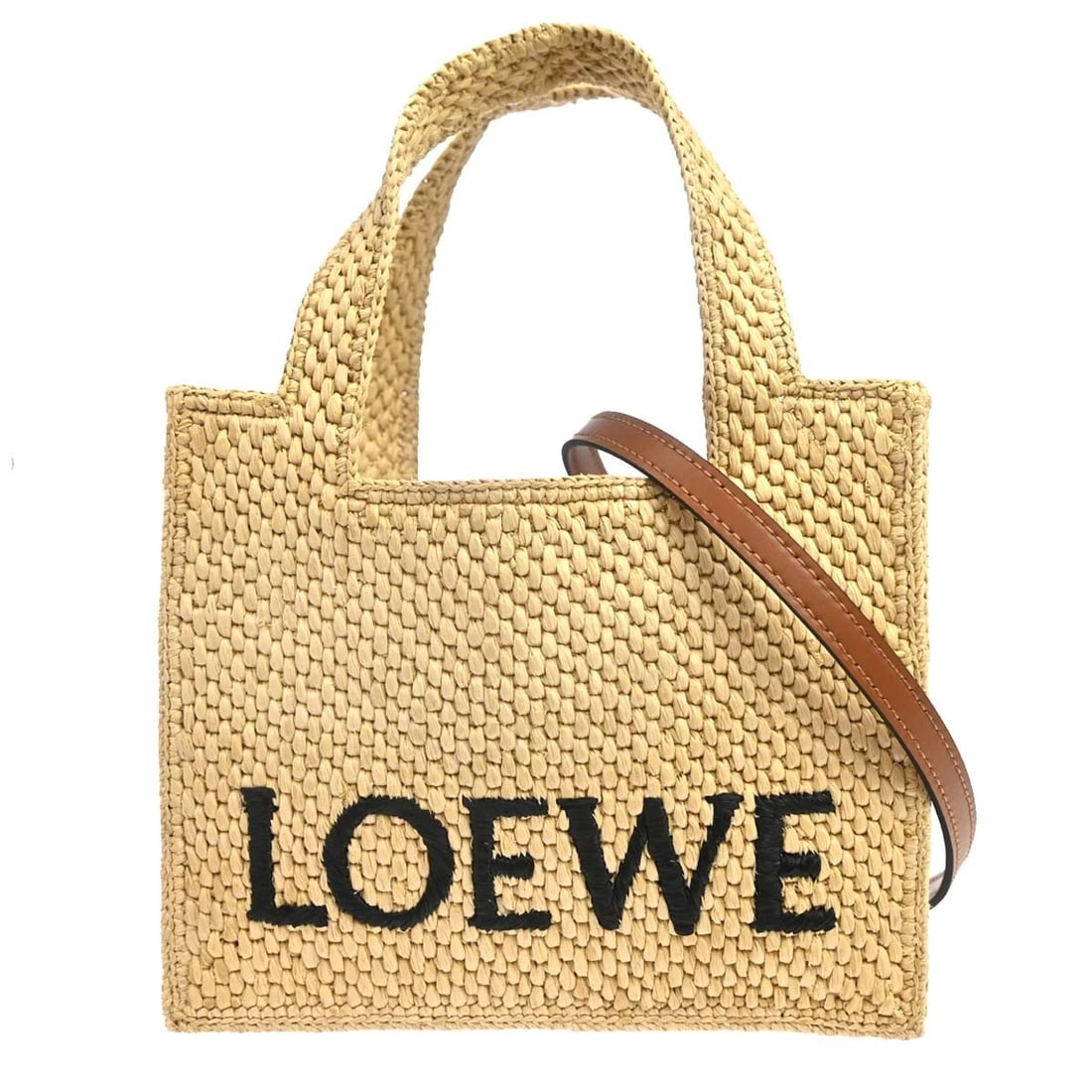 Loewe Font Mini Tote in Natural Raffia and Leather: Loewe Font Mini Tote in Natural Raffia and Leather Loewe Font Mini tote bag in natural raffia with brown leather trim. This women's tote features double handles and includes a detachable shoulder stra