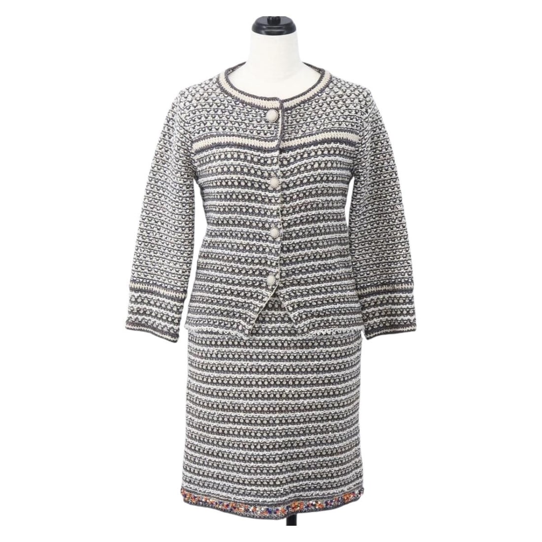 CHANEL Multicolor Nylon Tweed Jacket Without Collar France: CHANEL Multicolor Nylon Tweed Jacket Without Collar France This CHANEL jacket features a no-collar tweed design in a multicolor palette. Crafted from nylon, it offers a modern silhouette with a should