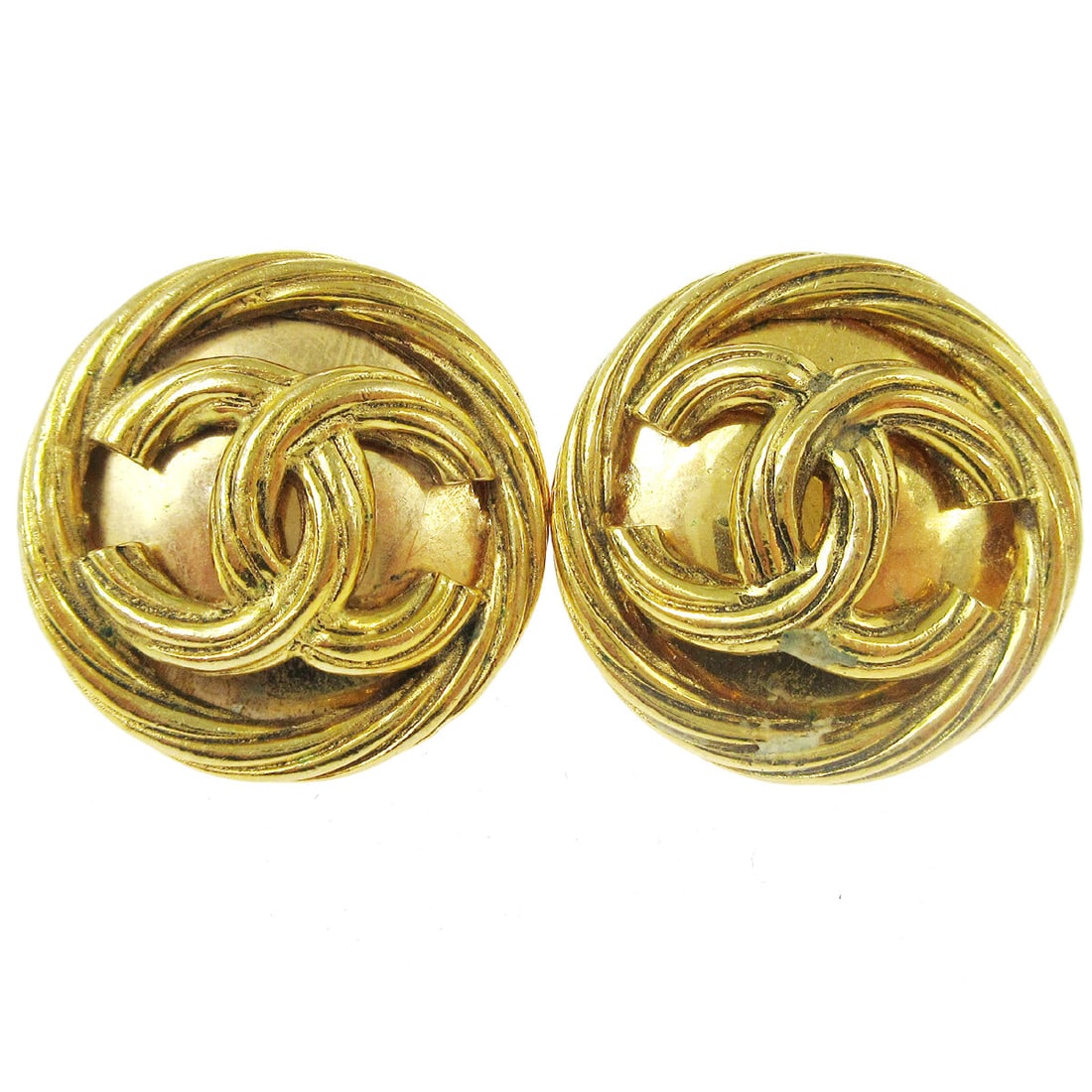 Chanel 93P 2919 Gold Tone CC Logo Button Clip Earrings: Chanel 93P 2919 Gold Tone CC Logo Button Clip Earrings Clip-on button earrings with a gold-tone finish and Chanel CC logo theme. Made in France, this pair is marked 93P/2919 and is presented in junk c